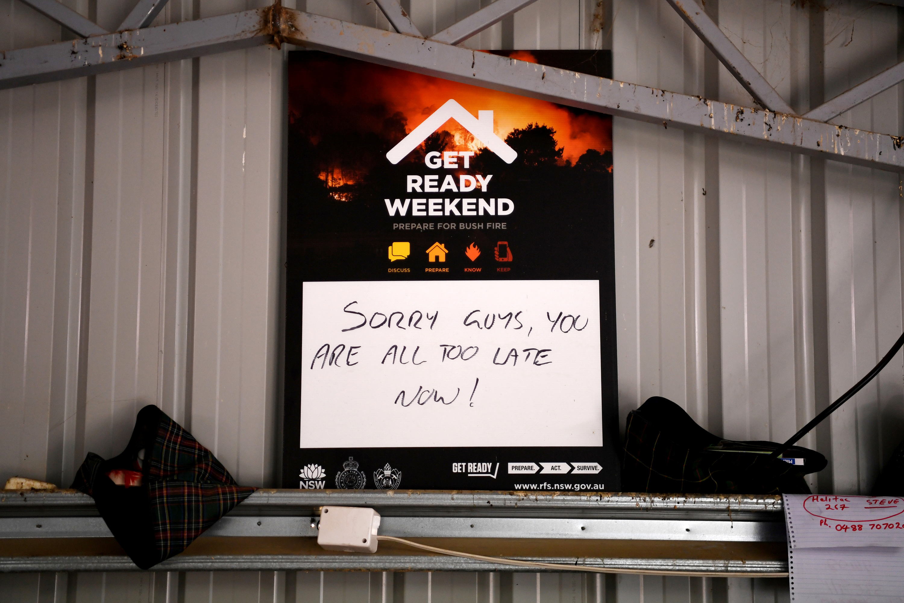 A fire preparation sign says, 'Sorry guys, you are all too late now!'