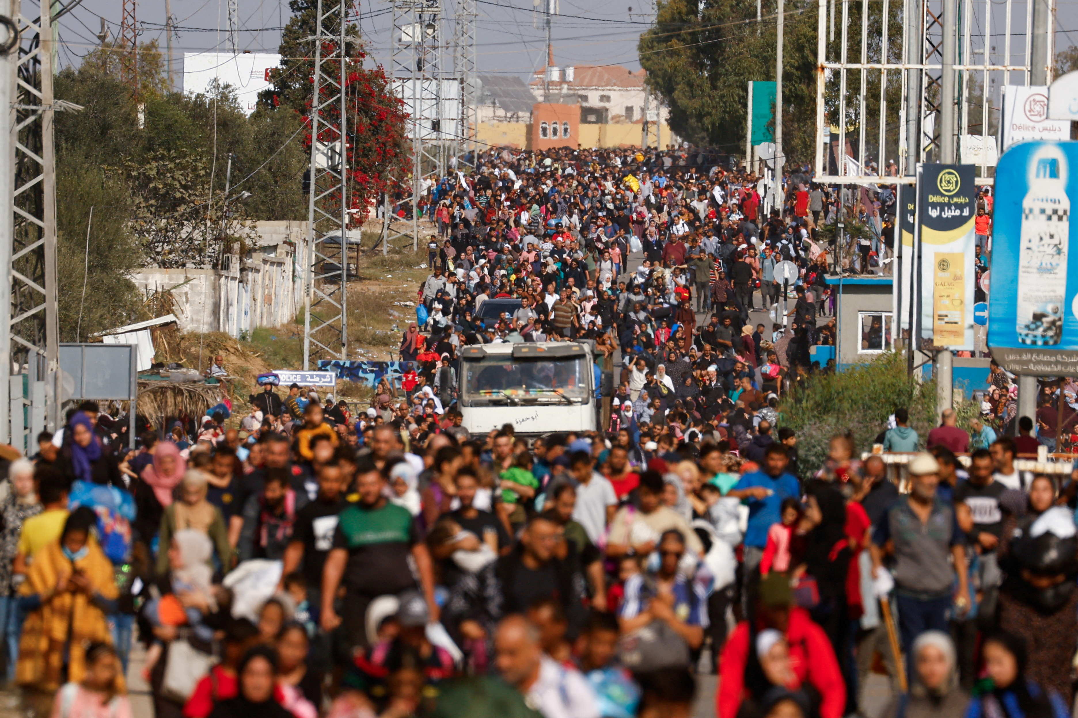 Palestinians fleeing north Gaza move southward as Israeli tanks roll deeper into the enclave, amid the ongoing conflict between Israel and Hamas, in the central Gaza Strip.