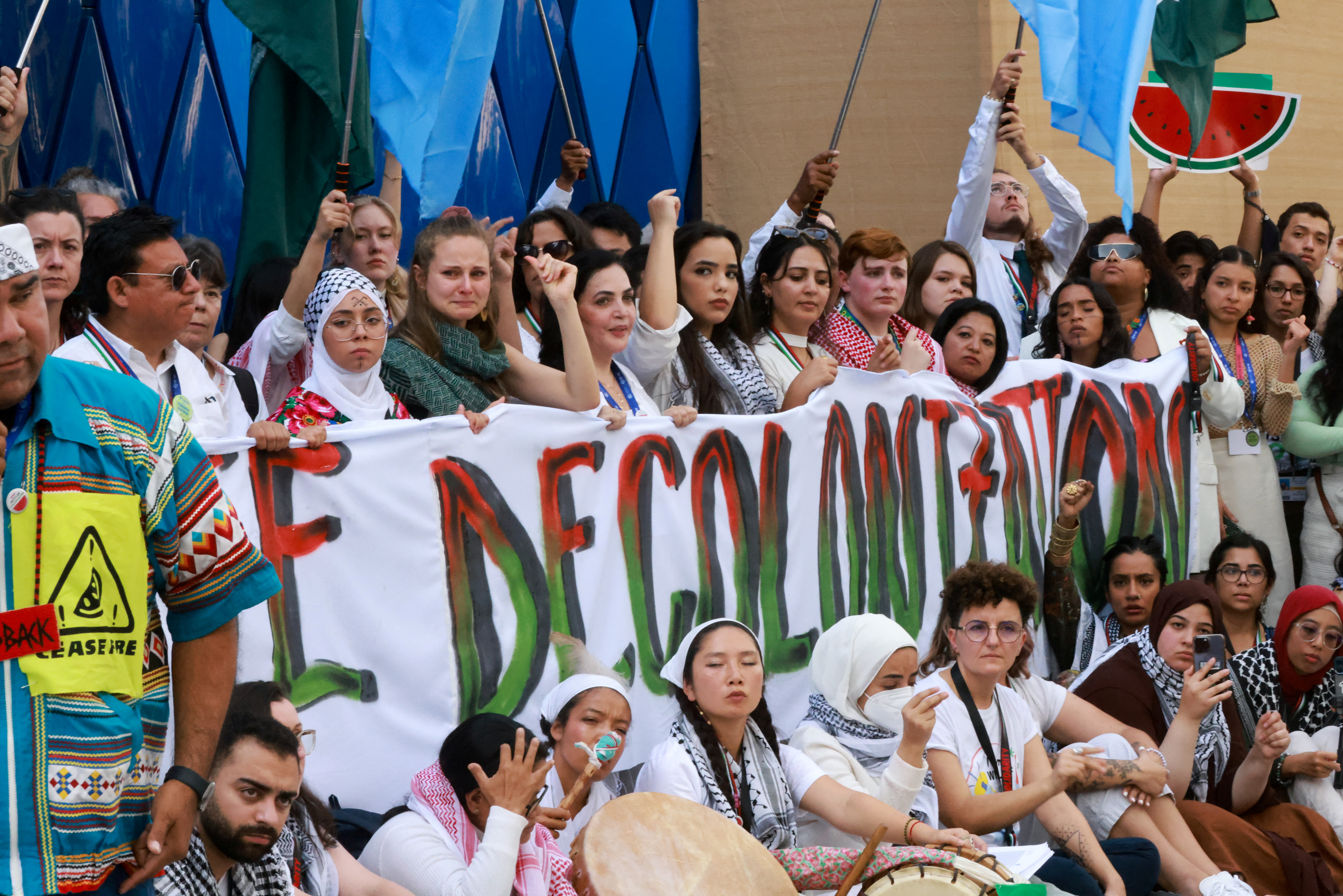 Climate activists protest in support of Palestinians in Gaza, at the United Nations Climate Change Conference (COP28) in Dubai, United Arab Emirates, December 3, 2023