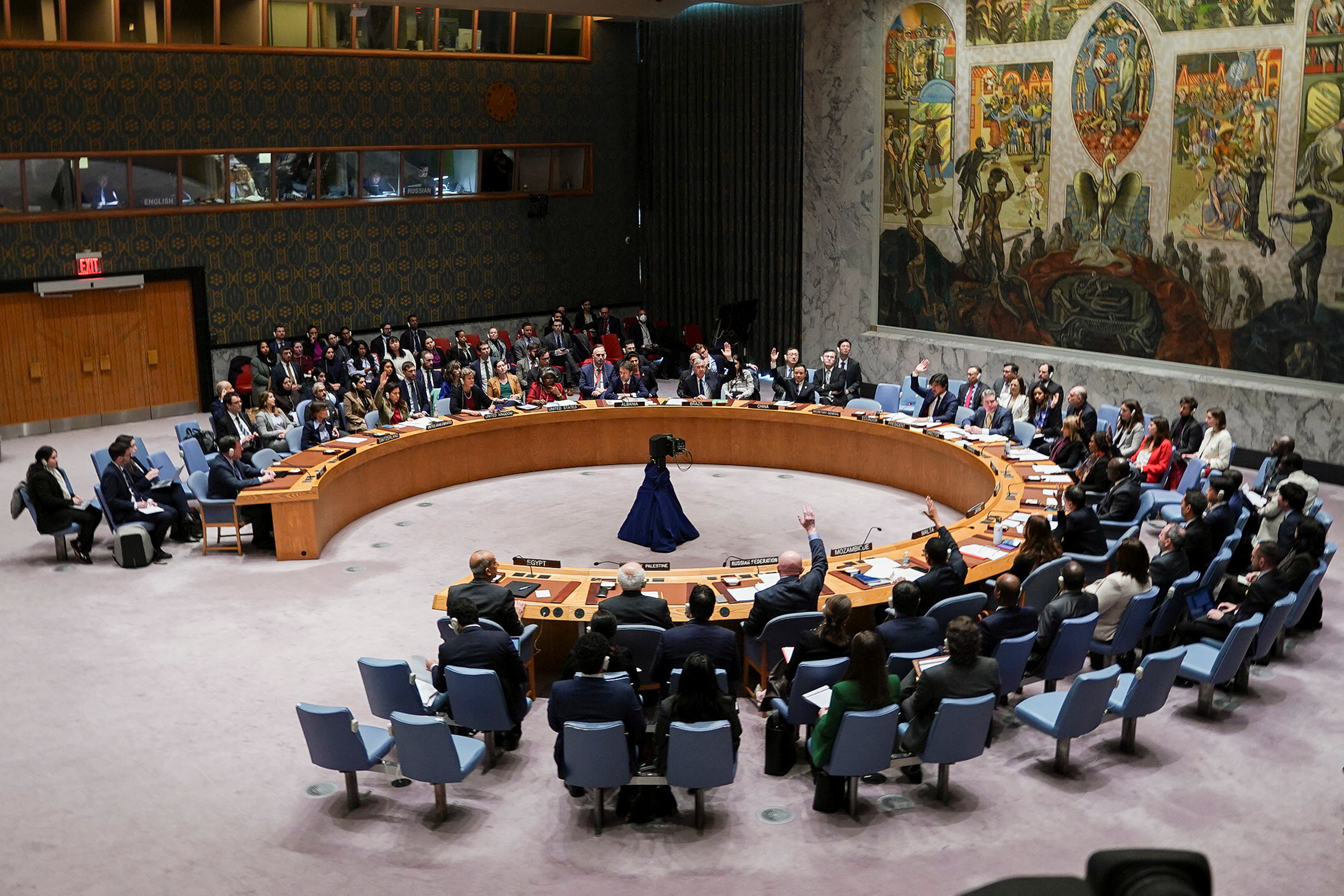 Members of the United Nations Security Council vote on a proposal to demand that Israel and Hamas allow aid access to the Gaza Strip - via land, sea and air routes - and set up U.N. monitoring of the humanitarian assistance delivered, during a meeting at the U.N. headquarters in New York, U.S., December 22