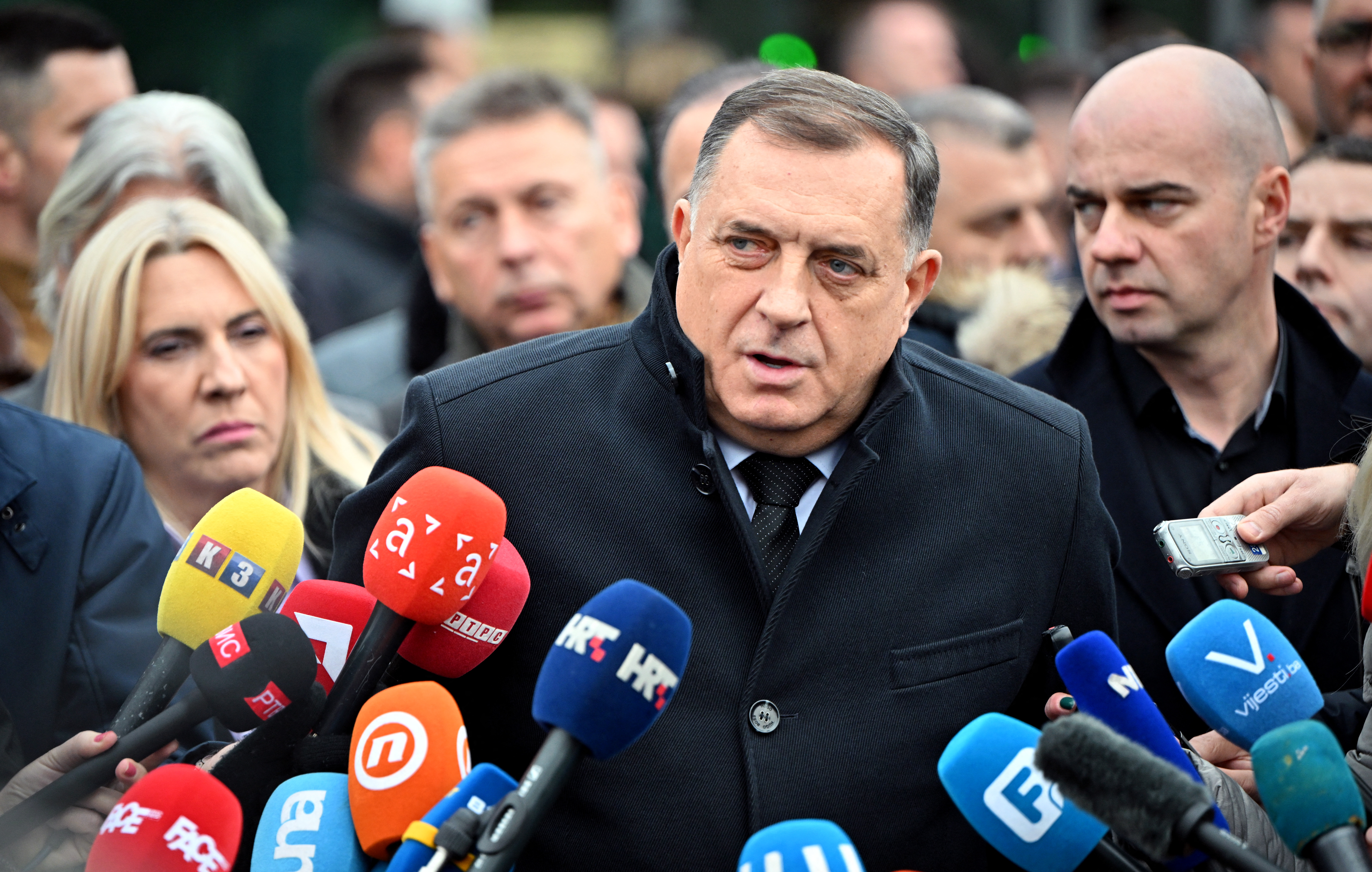 Bosnian Serb leader Milorad Dodik delivers a statement to journalists gathered in front of the courthouse of Bosnia-Herzegovina in Sarajevo on December 6, 2023. - Dodik has been indicted for refusing to recognise rulings made by an international envoy charged with overseeing the country's landmark peace accords