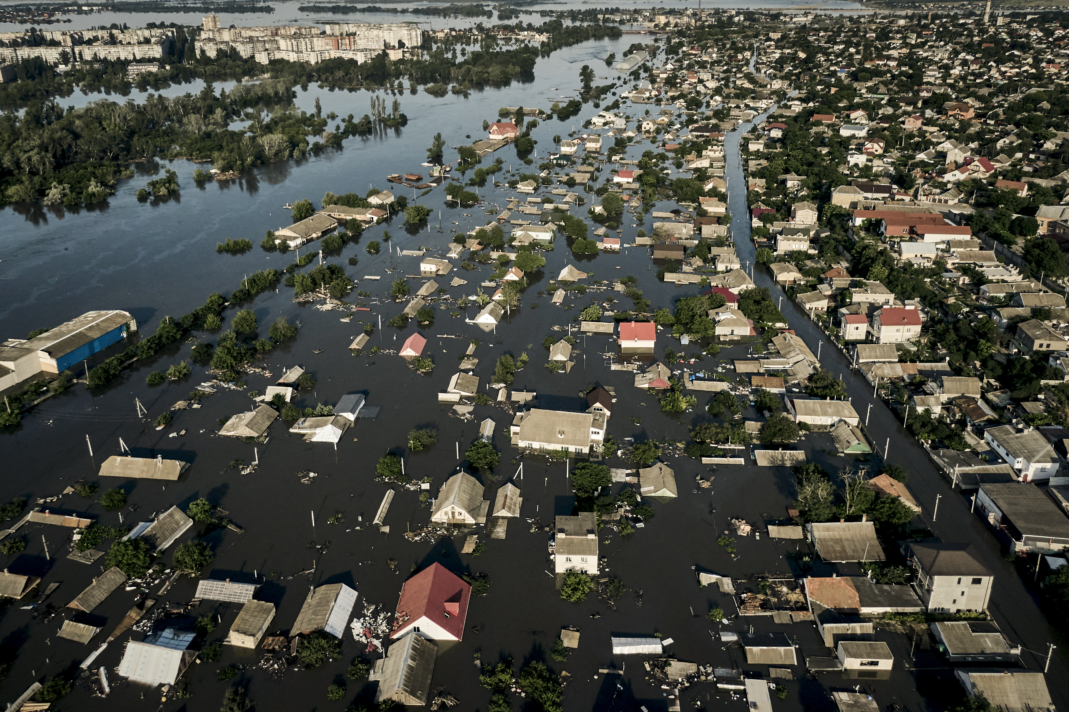 Streets are flooded in Kherson, Ukraine, Wednesday, June 7, 2023 after the walls of the Kakhovka dam collapsed