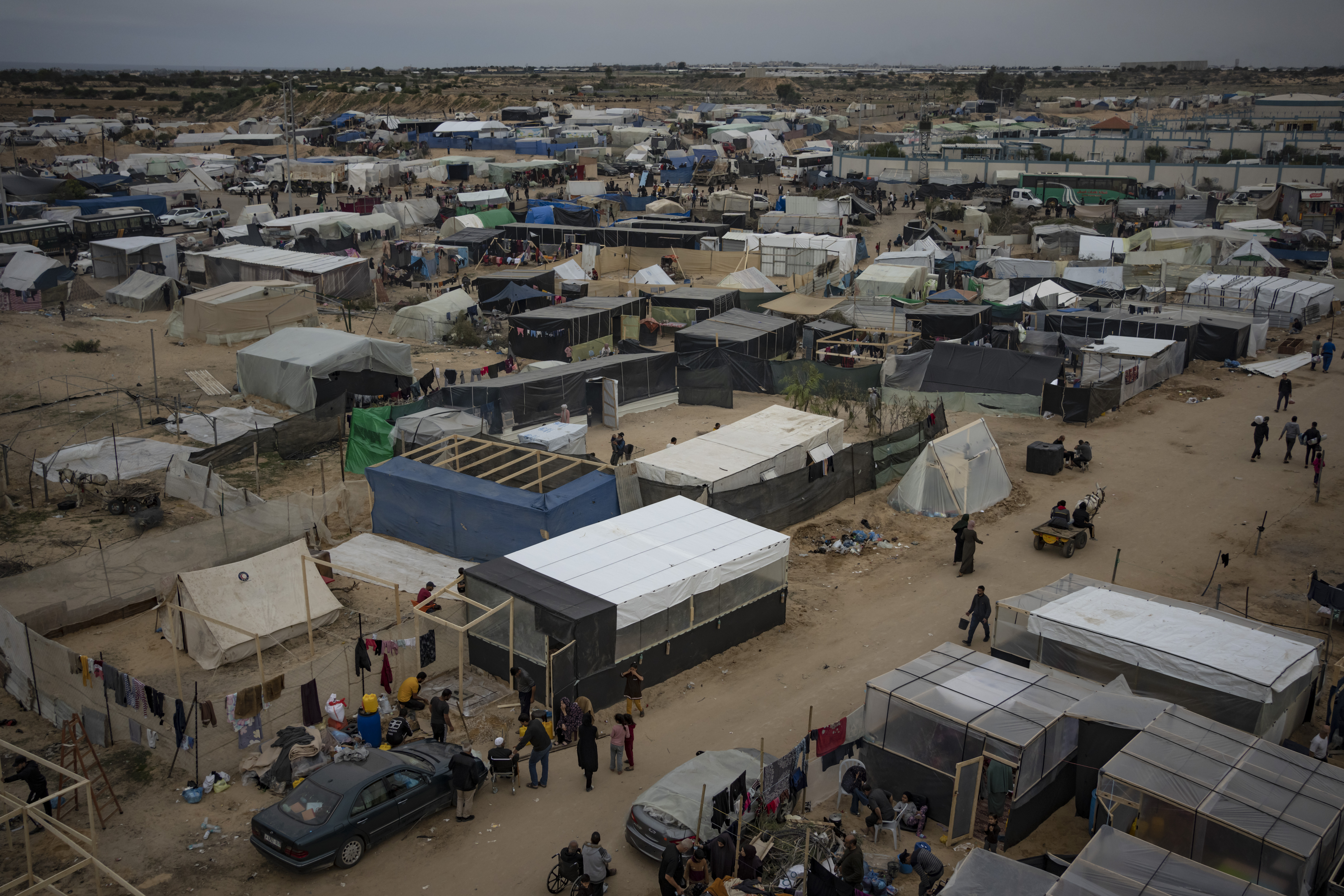 Palestinians displaced by the Israeli ground offensive on the Gaza Strip set up a tent camp in the Muwasi area.