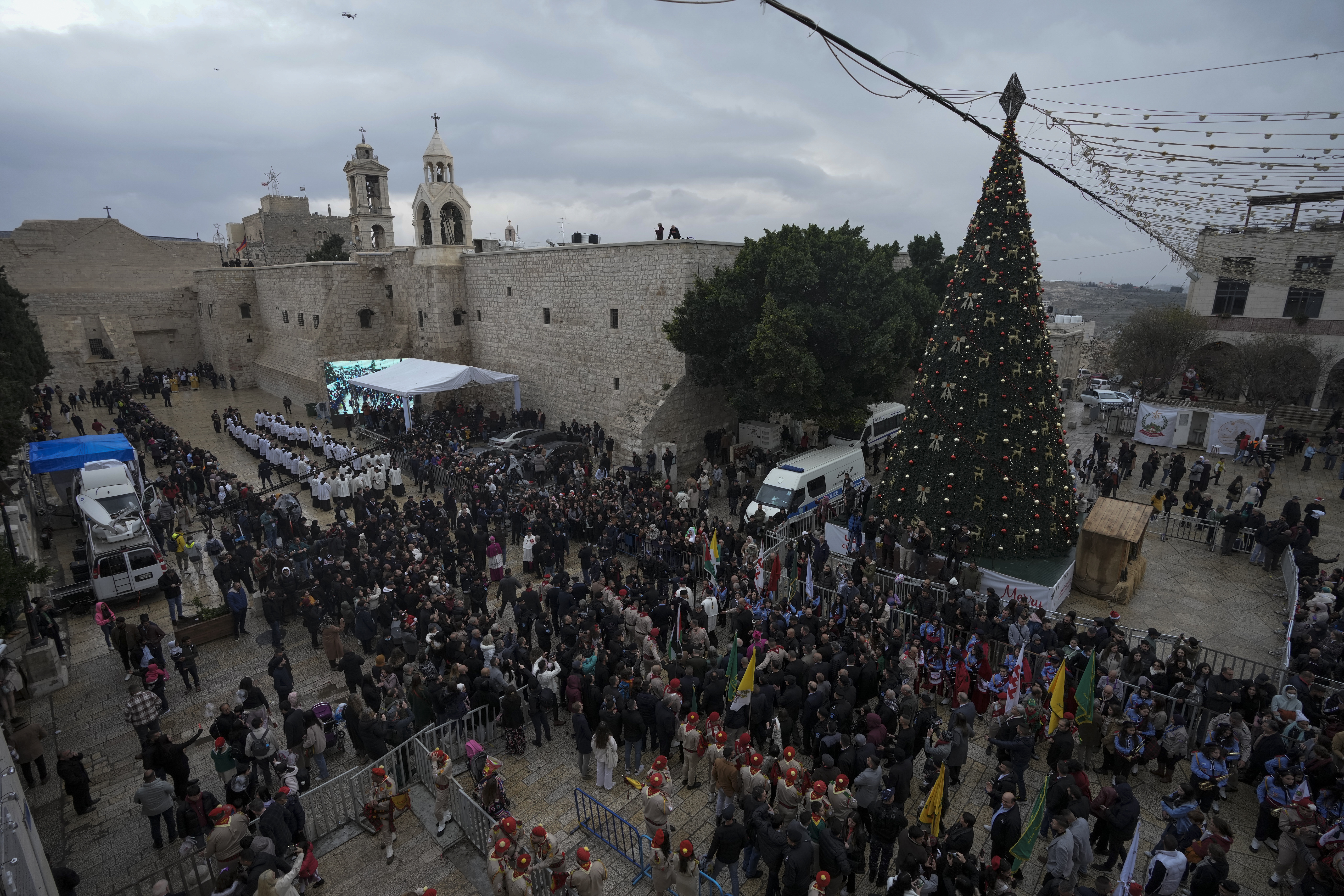 In this Saturday, Dec. 24, 2022, file photo, Latin Patriarch Pierbattista Pizzaballa greets worshippers in Manger Square, adjacent to the Church of the Nativity, traditionally believed to be the birthplace of Jesus Christ, in the West Bank town of Bethlehem during Christmas celebrations