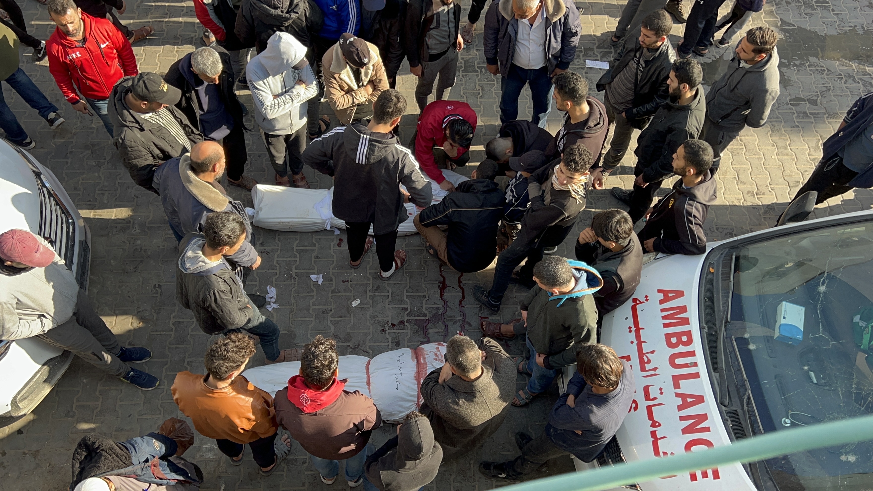 Dead Palestinian bodies are brought to the Kamal Adwan hospital