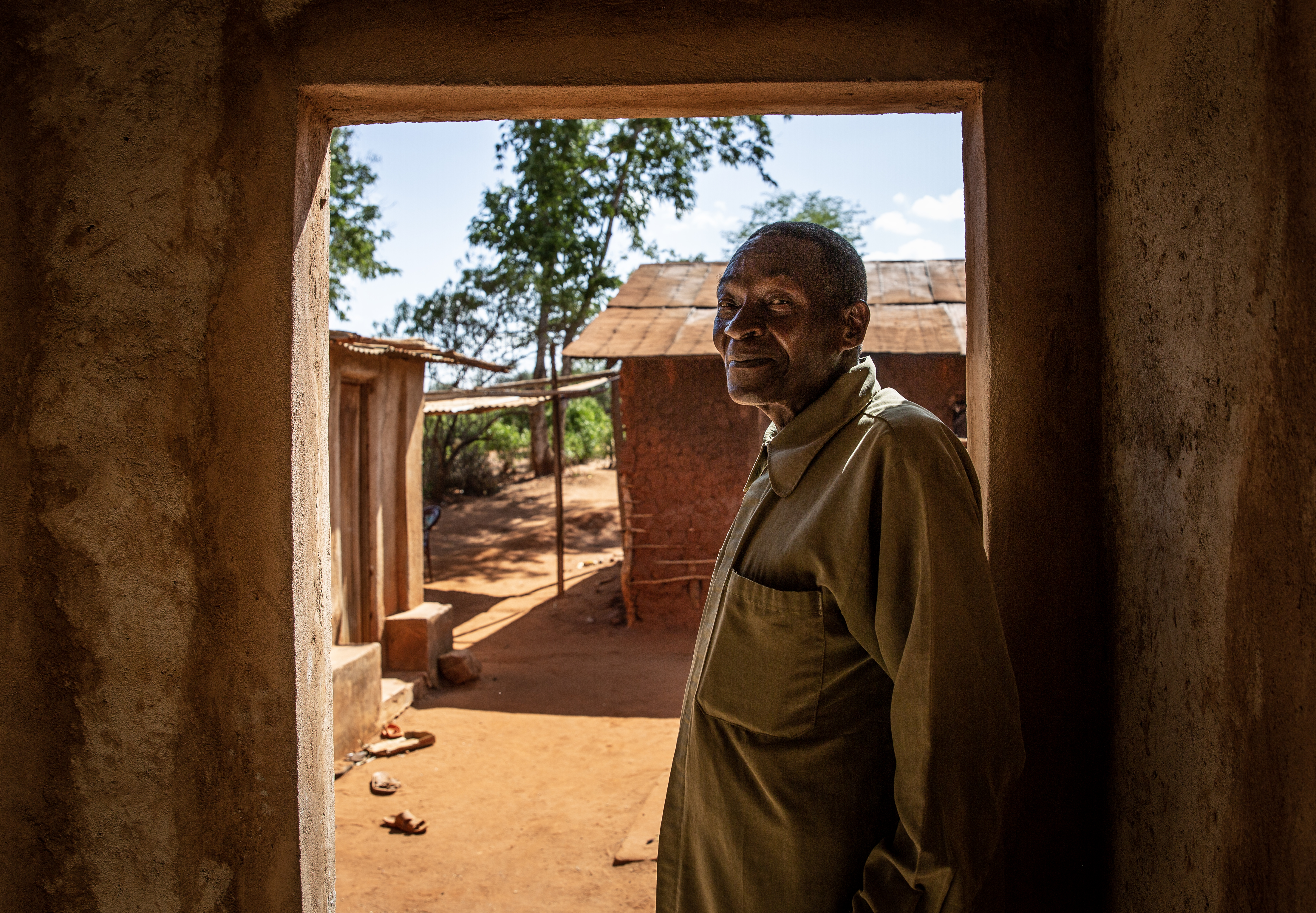 The traditional forecaster, Clement Mangi at his home in Taita Taveta. In Kenya, maize is a staple food and perceived as a safe crop.
