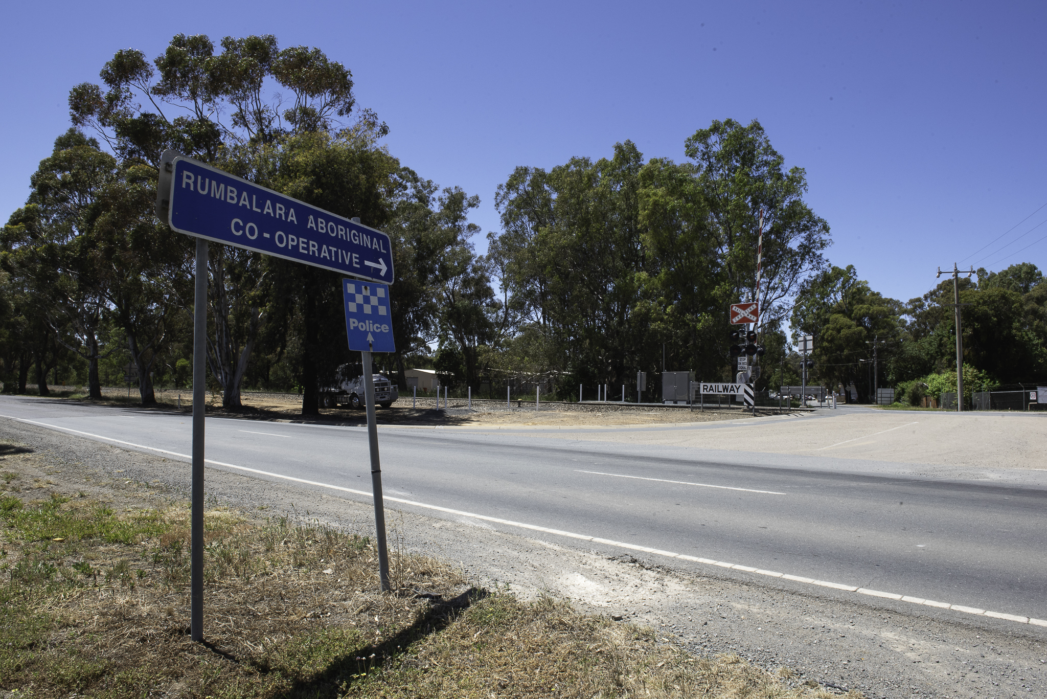 A road and bushland around the Rumbalara Aboriginal Cooperative