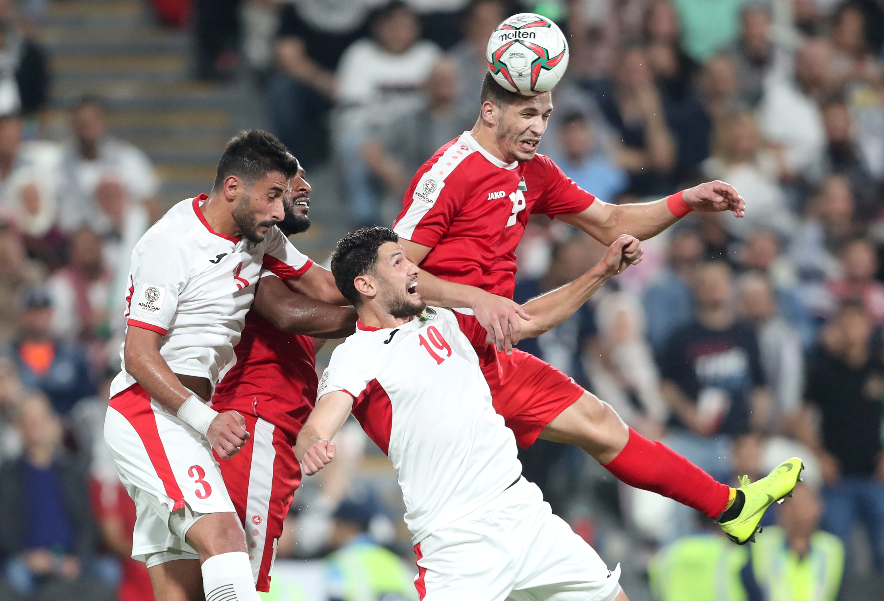 Palestine's Mahmoud Wadi heads for a goal during the AFC Asian Cup, Palestine v Jordan, Group B match at Mohammed Bin Zayed Stadium, Abu Dhabi, on January 15, 2019 [File: Suhaib Salem/Reuters]