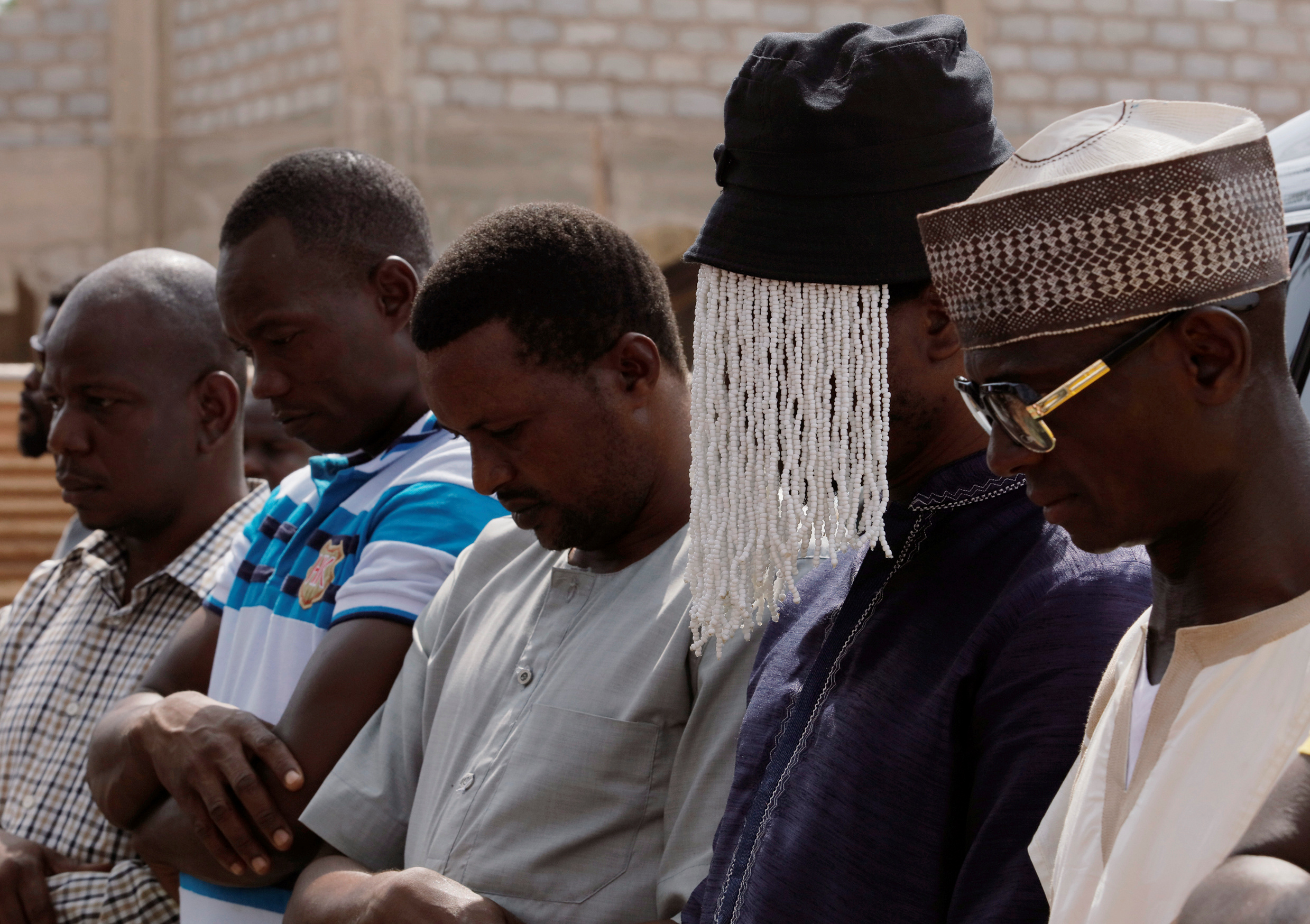 Ghanaian journalists at a funeral