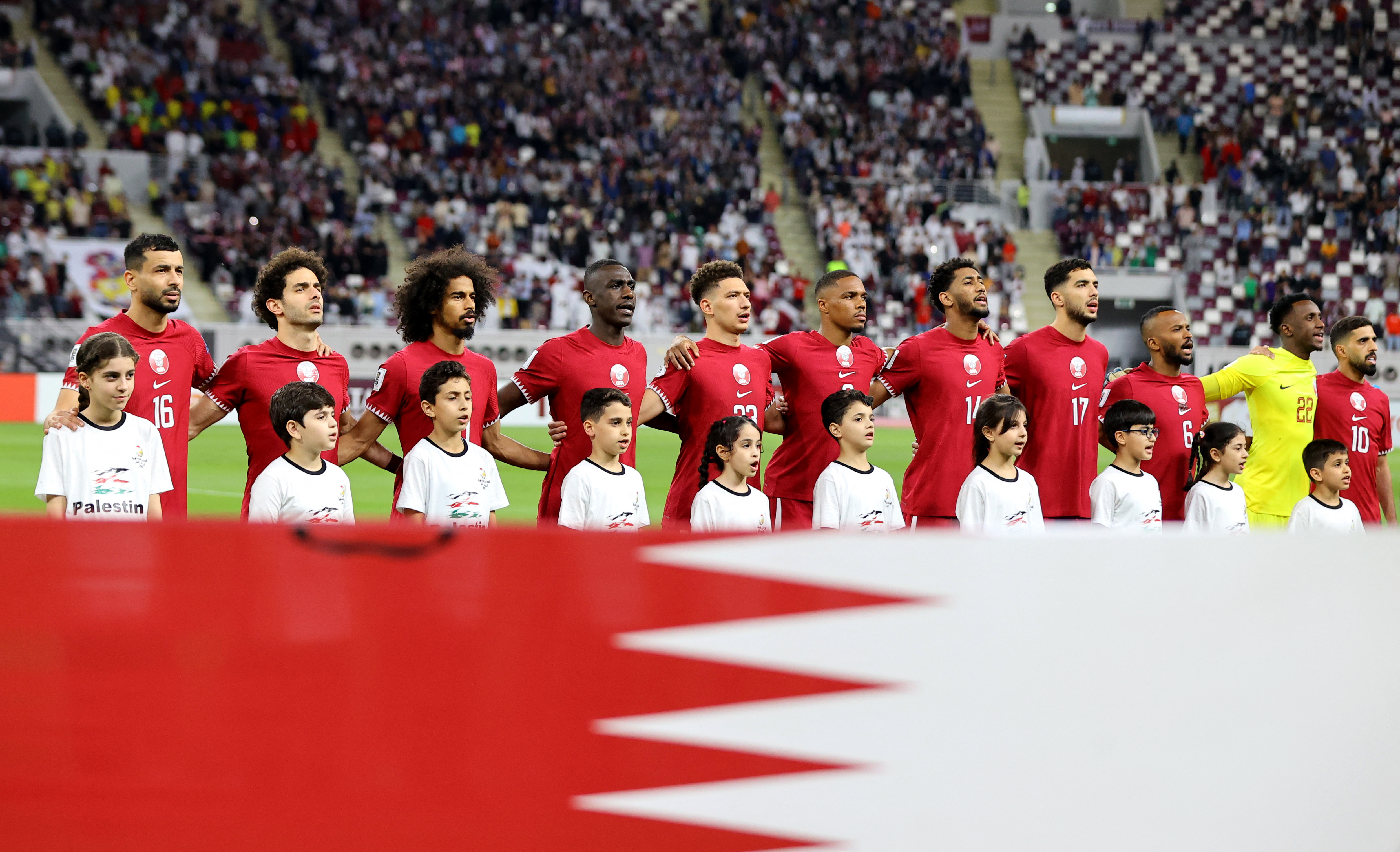 Soccer Football - World Cup - AFC Qualifiers - Group A - Qatar v Afghanistan - Khalifa International Stadium, Doha, Qatar - November 16, 2023 Qatar players during their national anthem before the match REUTERS/Ibraheem Al Omari