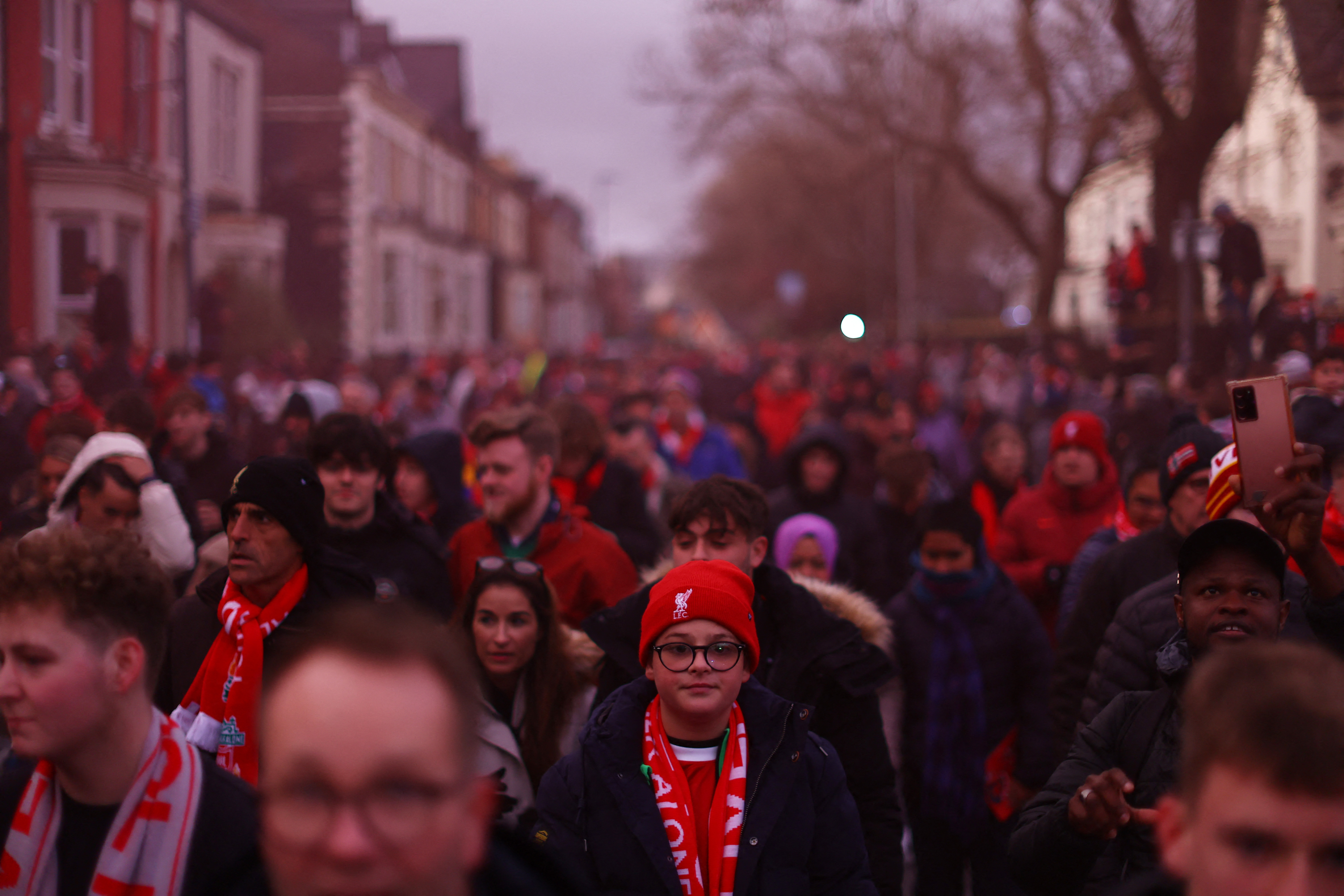 Soccer Football - Premier League - Liverpool v Arsenal - Anfield, Liverpool, Britain - December 23, 2023 Liverpool fans outside the stadium before the match REUTERS/Carl Recine NO USE WITH UNAUTHORIZED AUDIO, VIDEO, DATA, FIXTURE LISTS, CLUB/LEAGUE LOGOS OR 'LIVE' SERVICES. ONLINE IN-MATCH USE LIMITED TO 45 IMAGES, NO VIDEO EMULATION. NO USE IN BETTING, GAMES OR SINGLE CLUB/LEAGUE/PLAYER PUBLICATIONS.