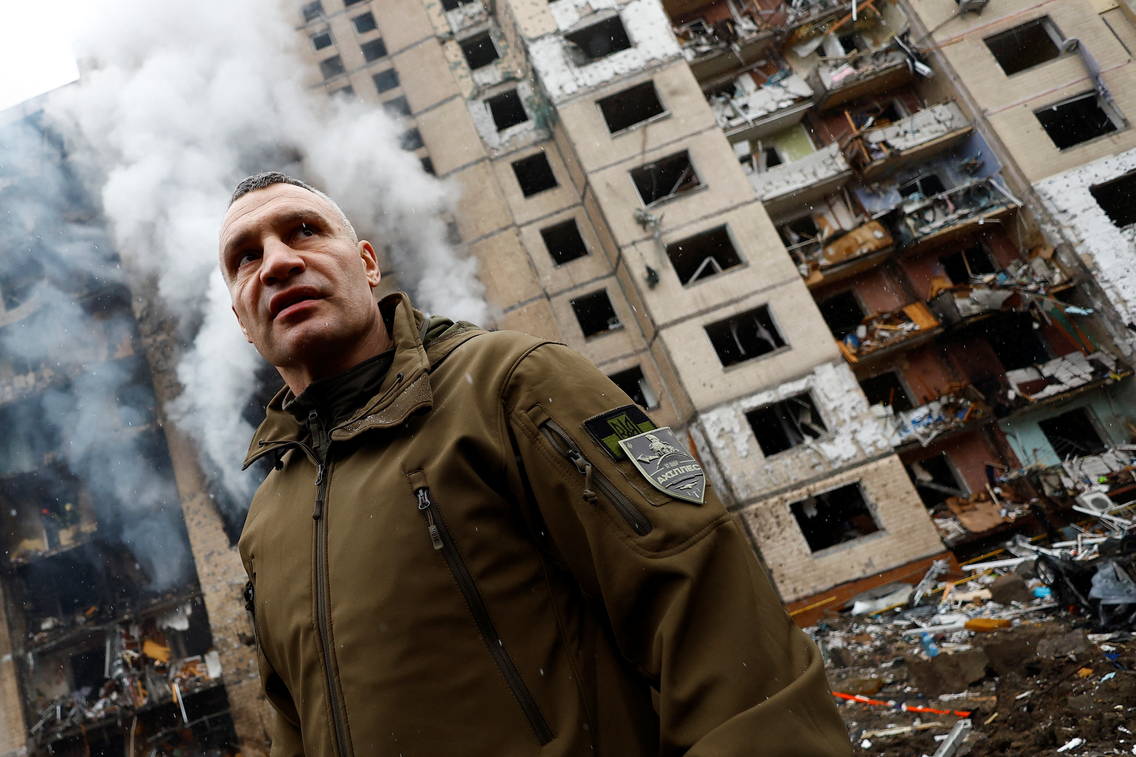 Kyiv Mayor Vitali Klitschko visits the site of a residential building heavily damaged during a Russian missile attack, amid Russia's attack on Ukraine, in Kyiv, Ukraine January 2, 2024