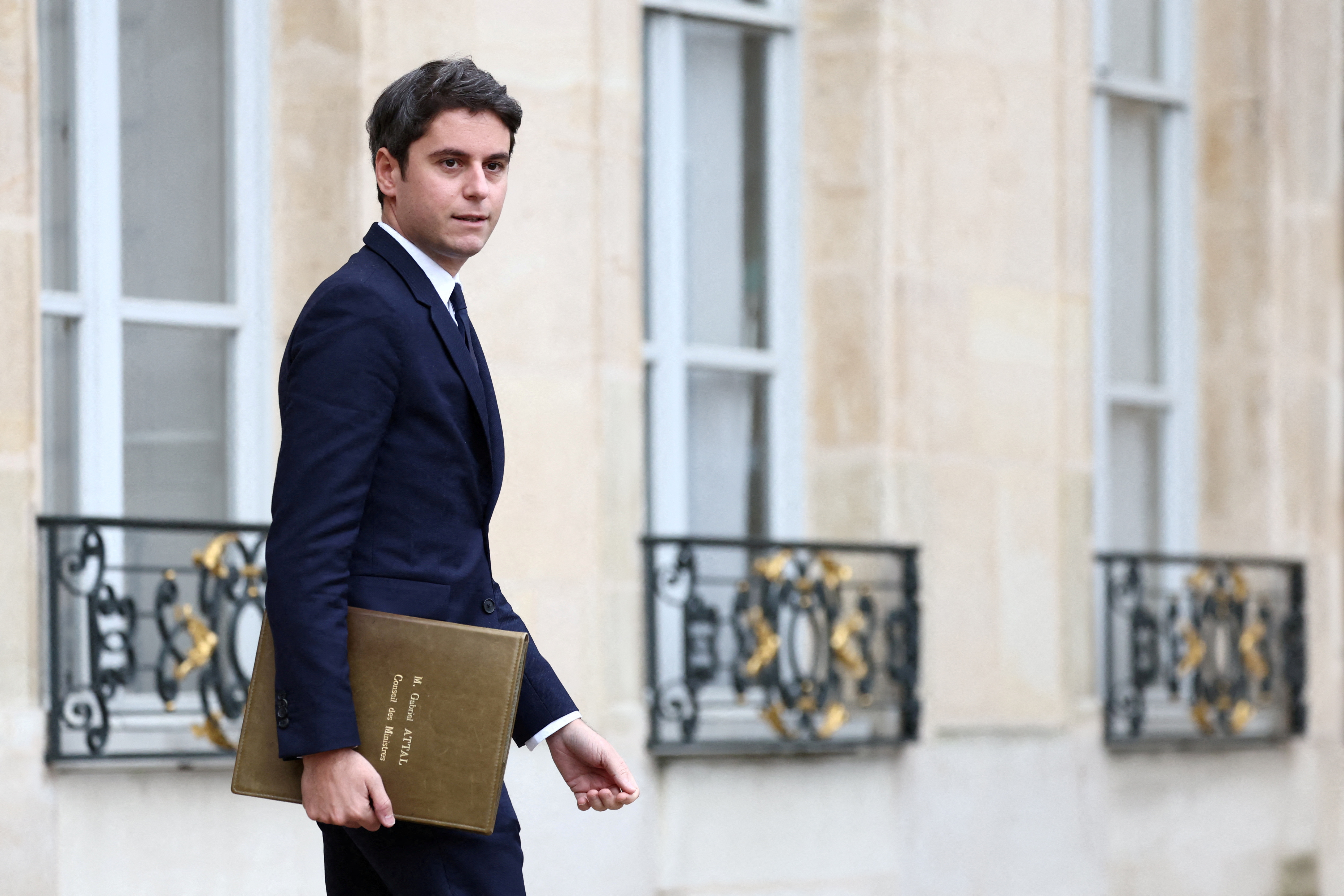 Gabriel Attal leaves following the weekly cabinet meeting at the Elysee Palace in Paris, France, December 12, 2023.