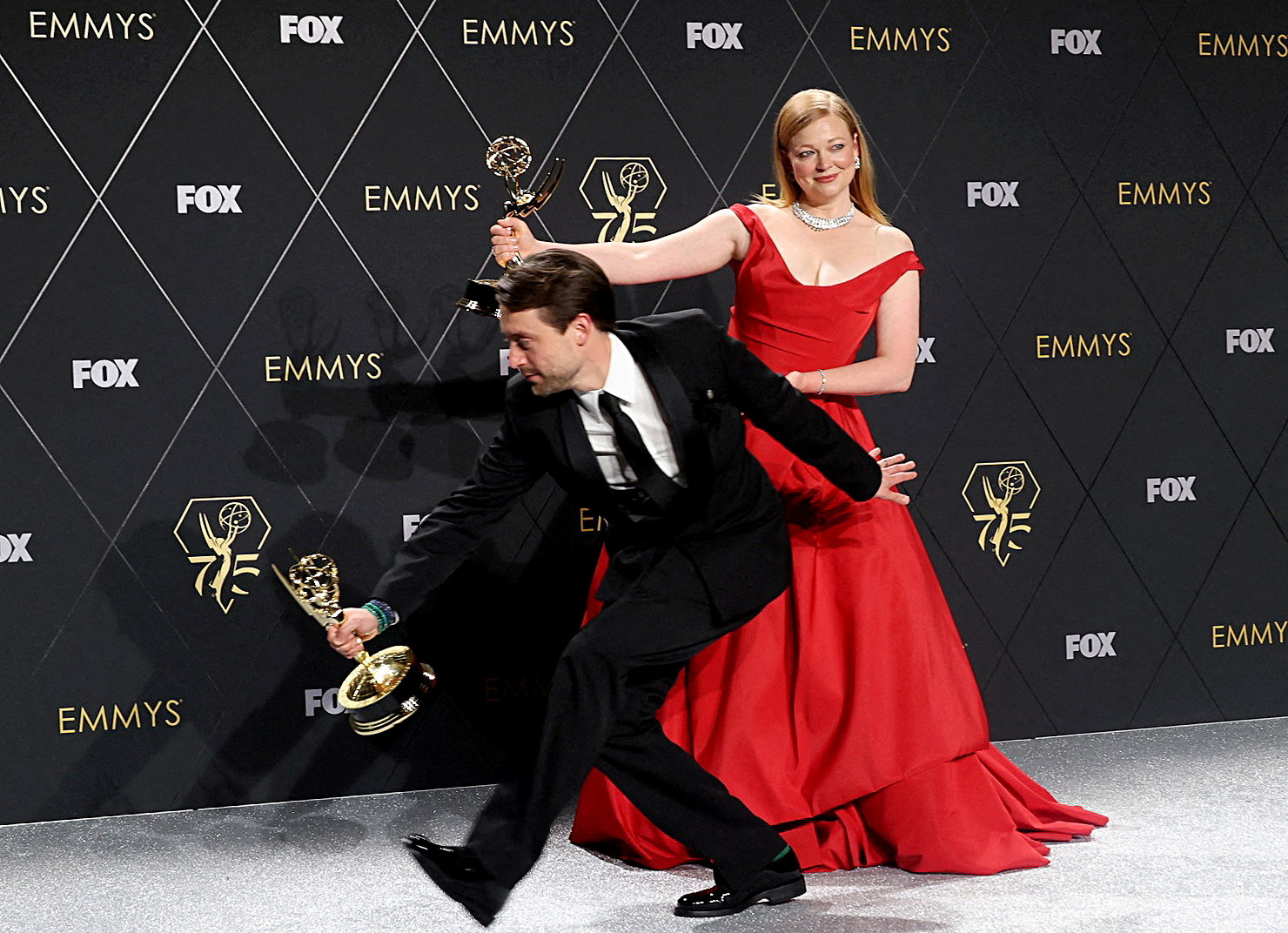 Sarah Snook and Kieran Culkin pose togetehr with the Lead Actress in a Drama Series award and the Lead Actor in a Drama Series award for "Succession", at the 75th Primetime Emmy Awards in Los Angeles, California, U.S., January 15