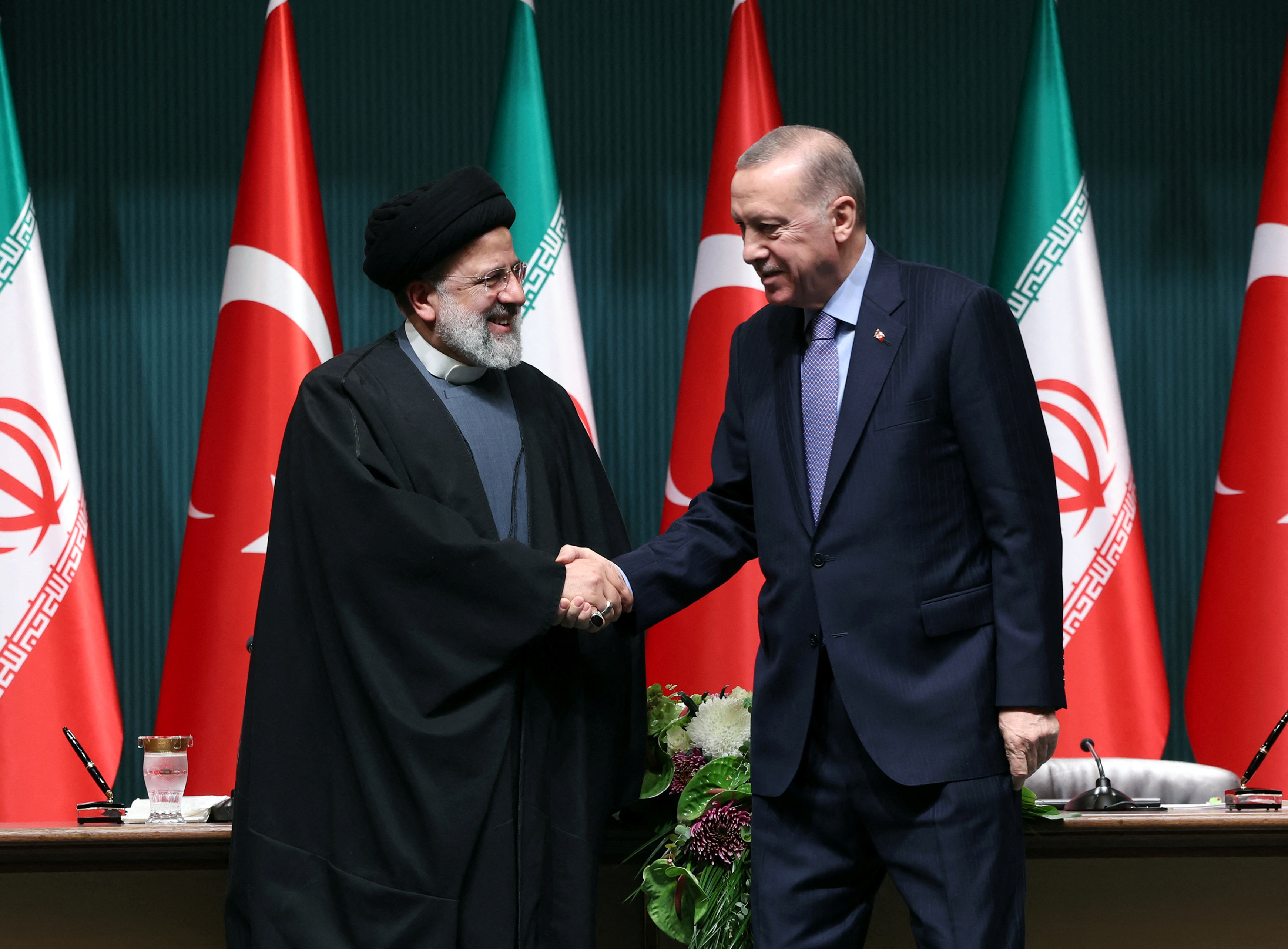 Turkey's President Tayyip Erdogan and Iran's President Ebrahim Raisi