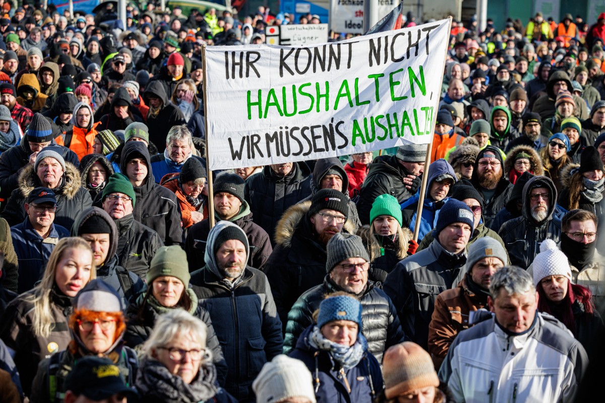 Protesters take part in a demonstration against the federal government's austerity plans in Halle an der Saale, eastern Germany,