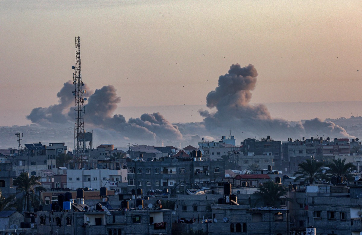 Smoke billowing over Khan Younis in the southern Gaza Strip during Israeli bombardment