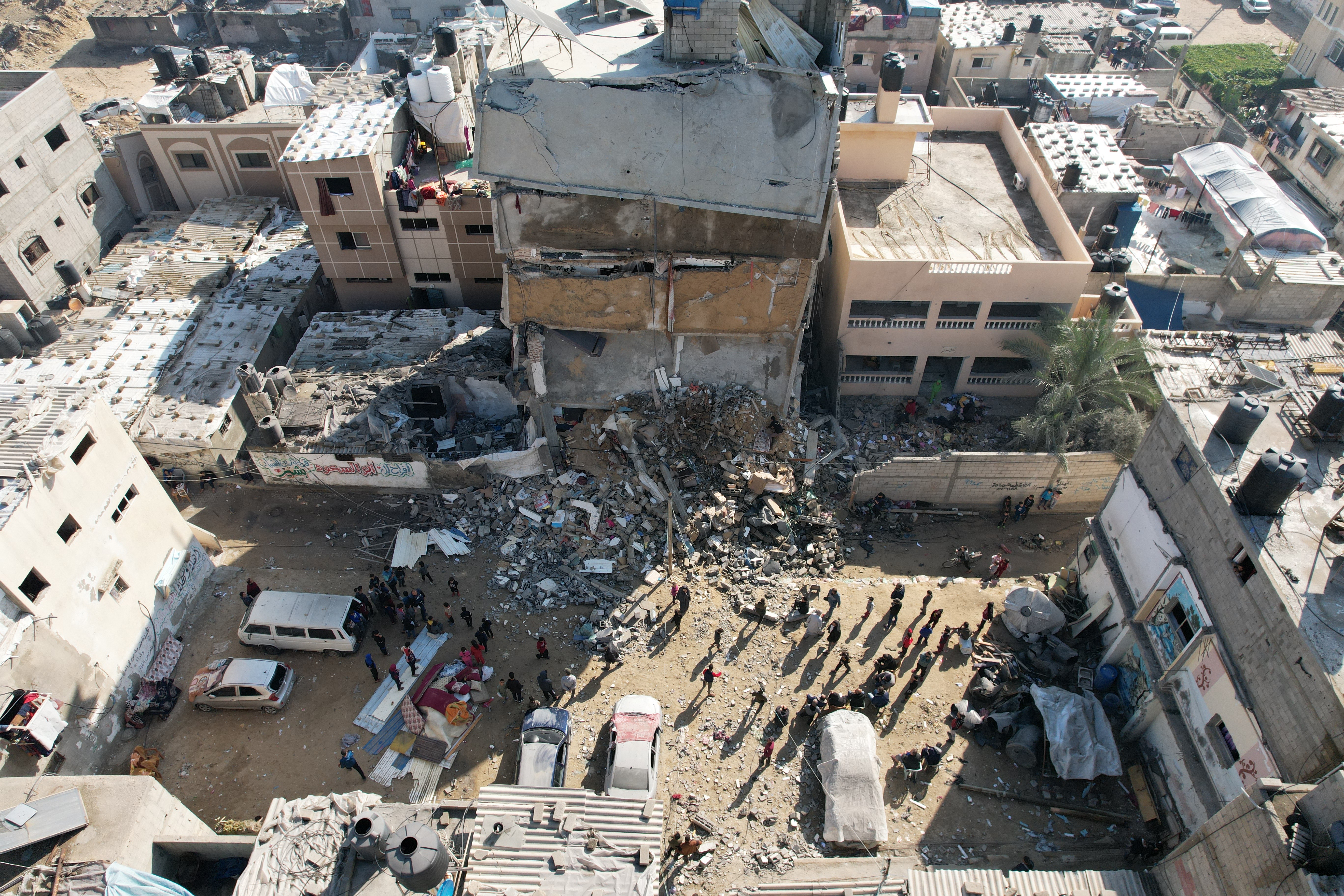 An aerial view of collapsed buildings as the Israeli airstrikes continue in Deri Al-Balah, Gaza on January 4, 2024.
