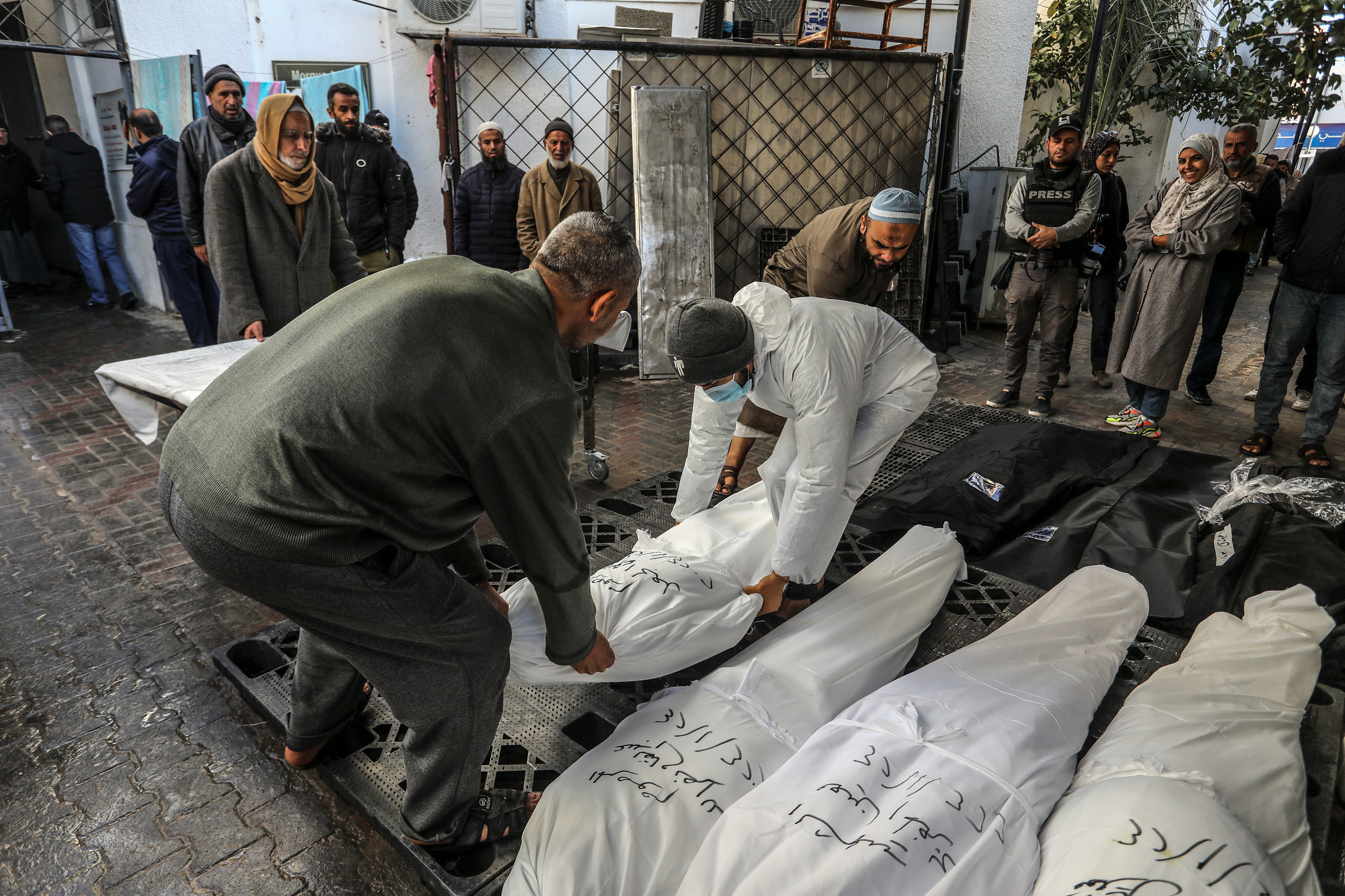 Relatives of Palestinians who lost their lives following Israeli attacks in Khan Yunis
