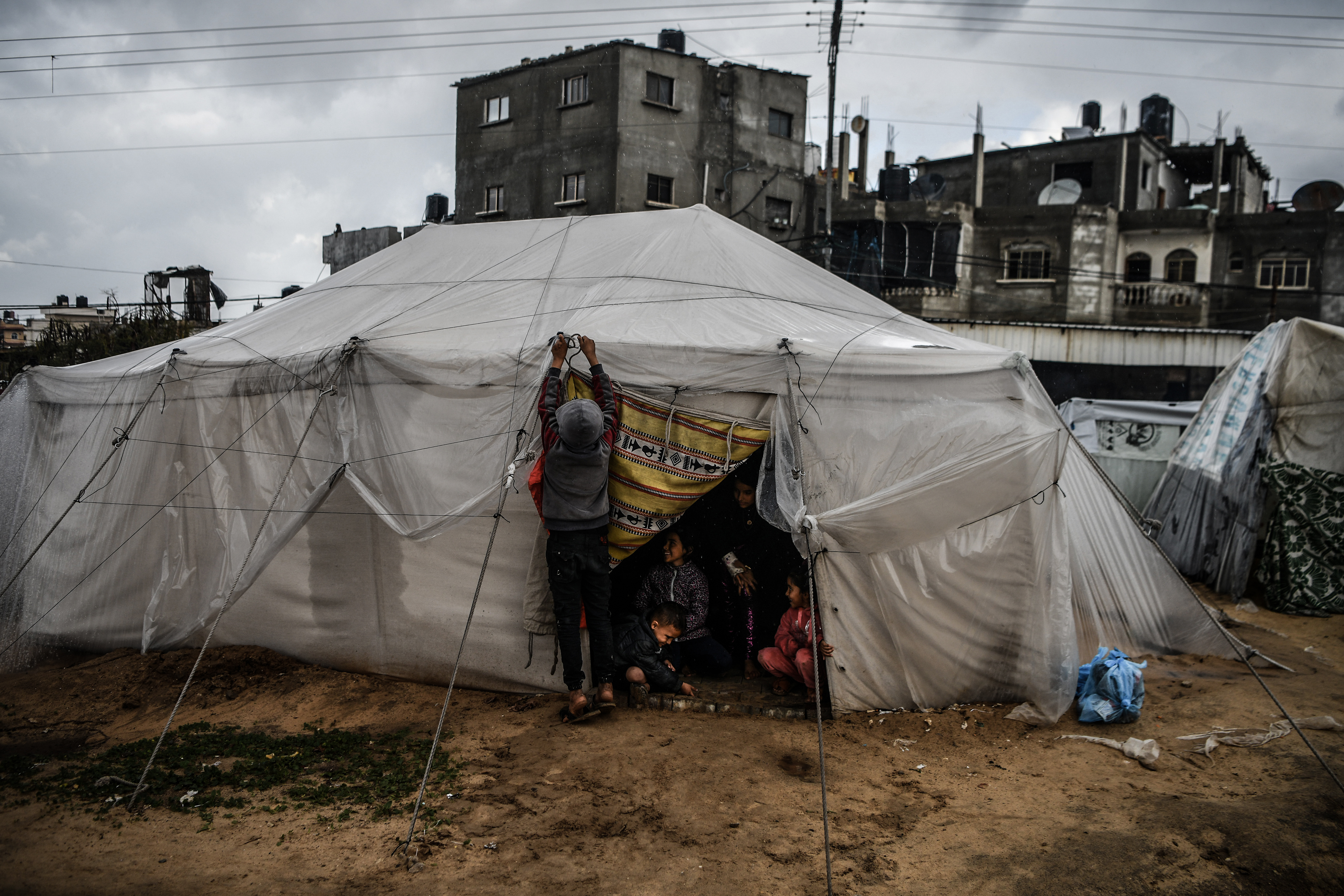 A view of a makeshift tent where Palestinians, who left their homes to protect themselves from Israeli bombardment, stay during the cold weather as they struggle with hard living conditions in Rafah