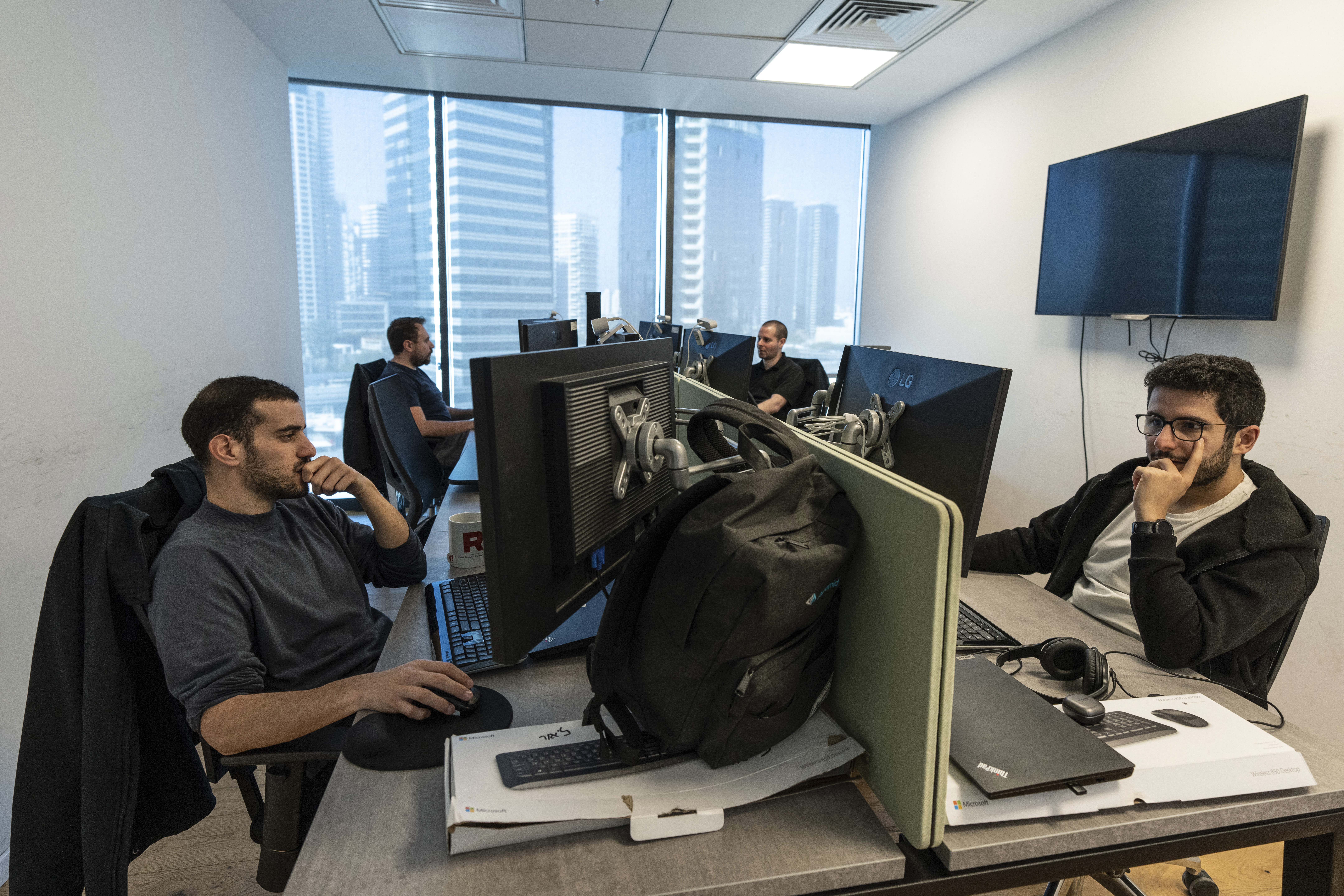Employees of Pyramid Analytics hi-tech company work at their office in Ramat Gan, Israel