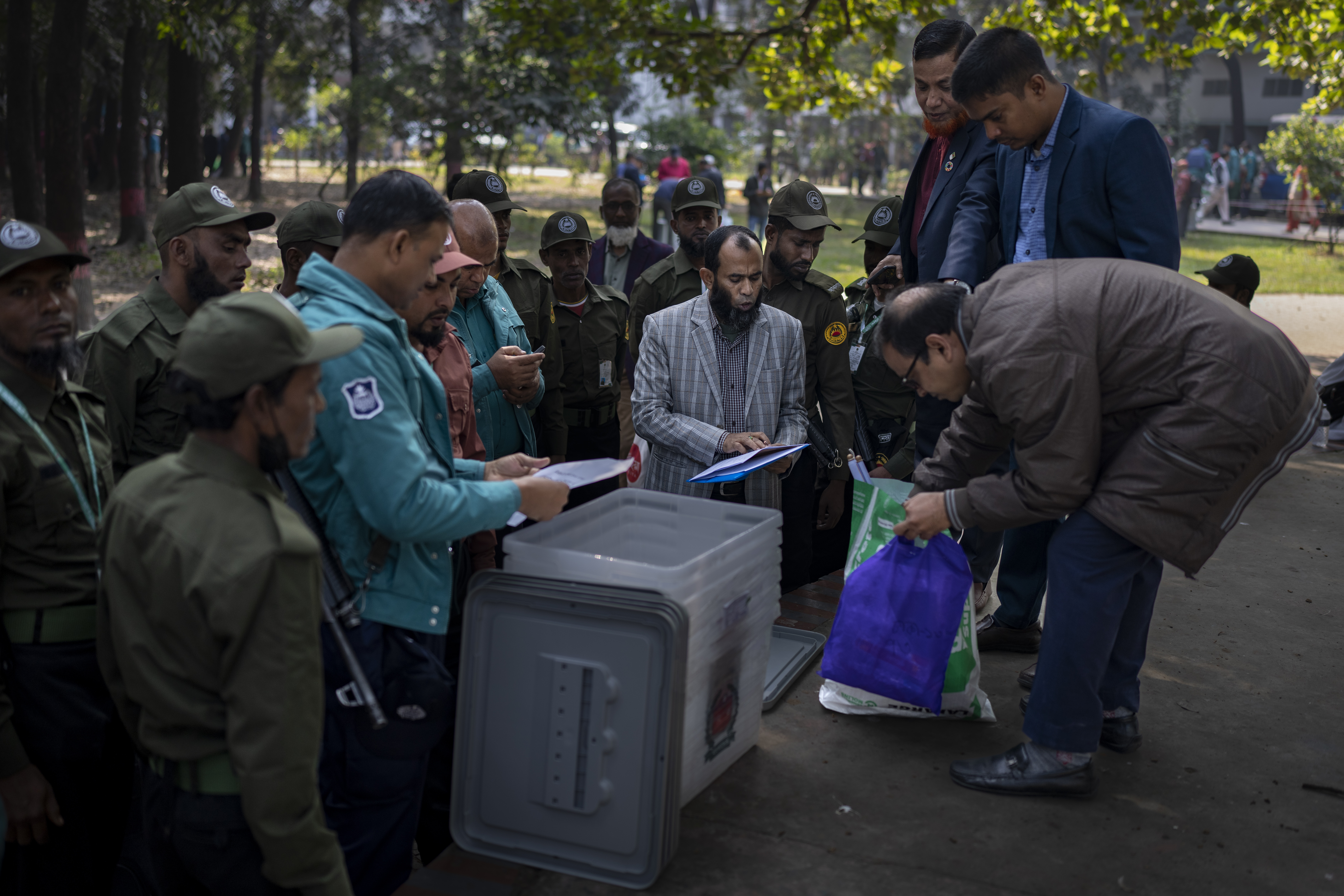 Election officers tally material received in preparation for the general elections in Dhaka, Bangladesh, Saturday, Jan. 6, 2024. Bangladesh’s main opposition party has enforced a 48-hour general strike from Saturday across the South Asian nation as the nation is ready to hold its next general election a day later.
