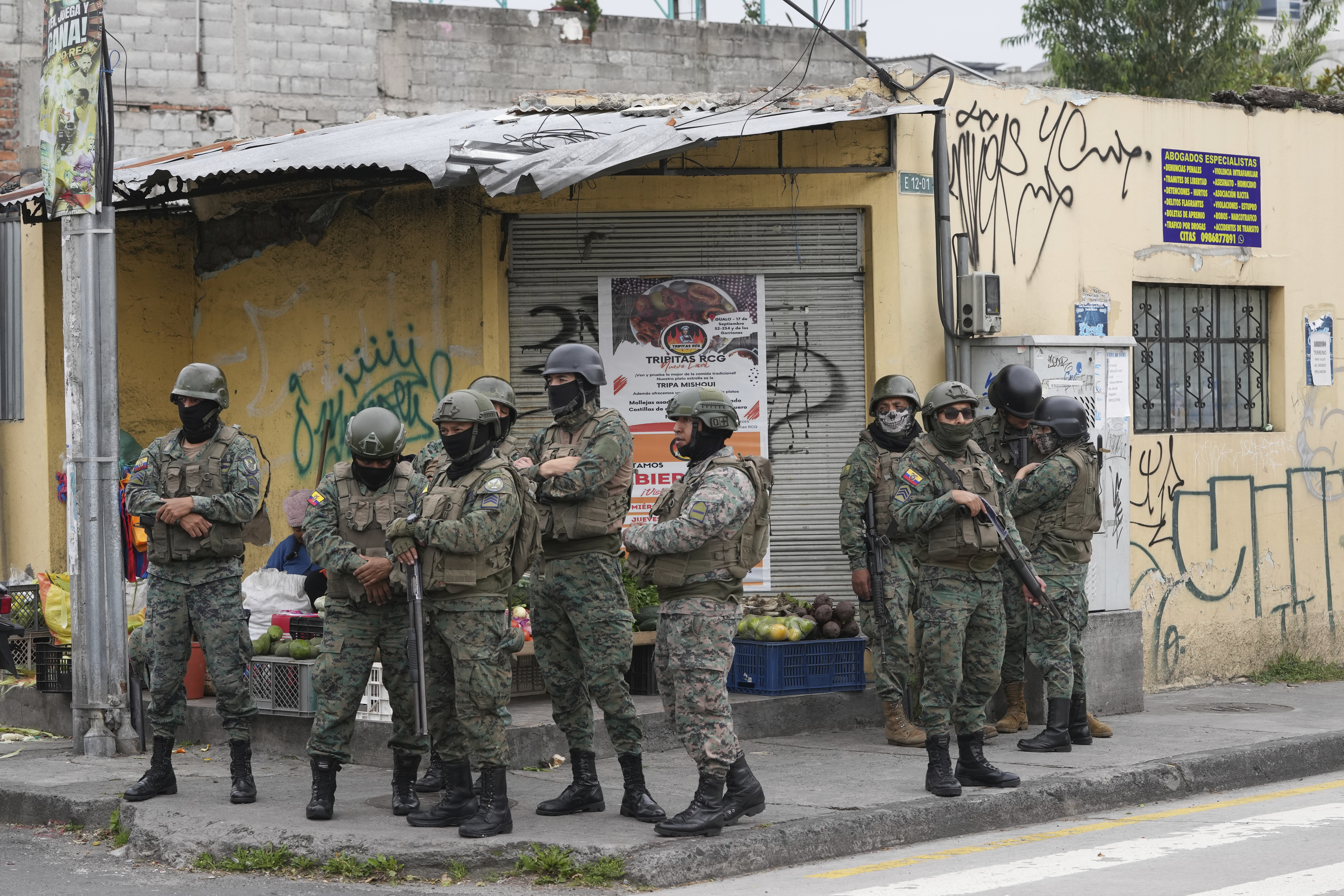 Soldiers patrol the perimeter of Inca prison during a state of emergency in Quito, Ecuador