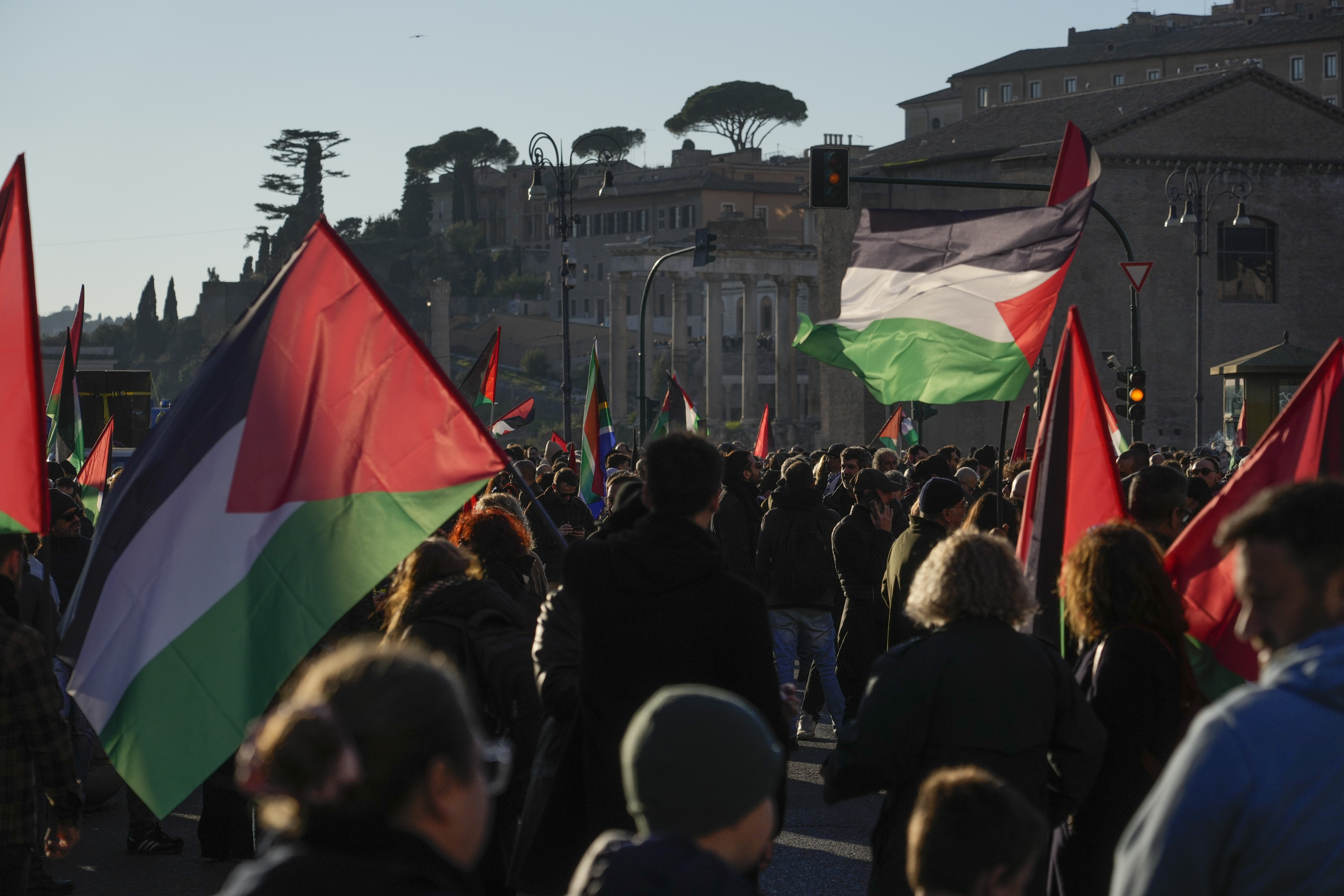 Protesters gather during a rally in support of the Palestinians in Rome