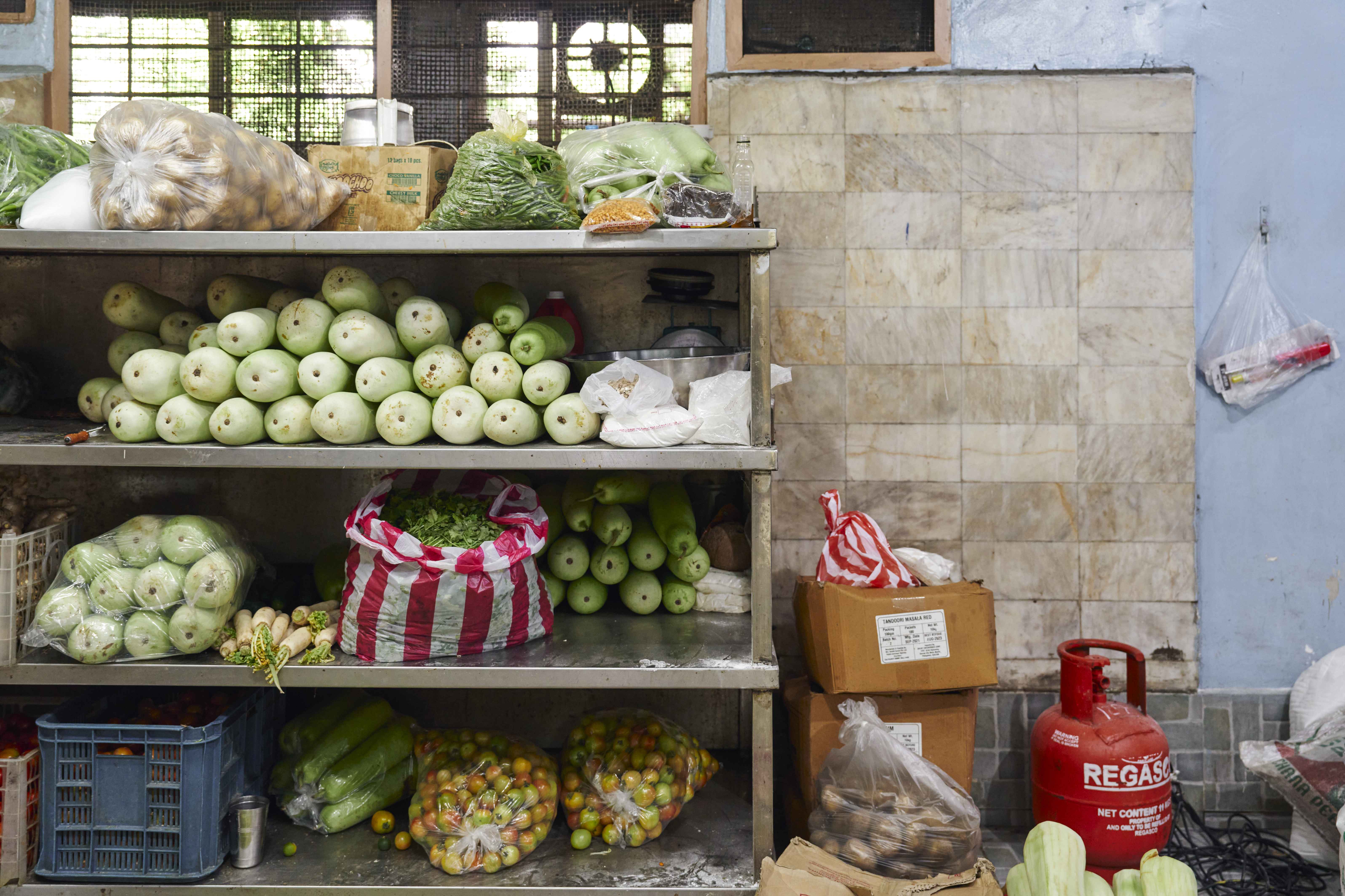 The fresh produce used for meals at the Khalsa Diwan Skih Temple Manila is provided by community volunteers [Sonny Thakur/Al Jazeera]
