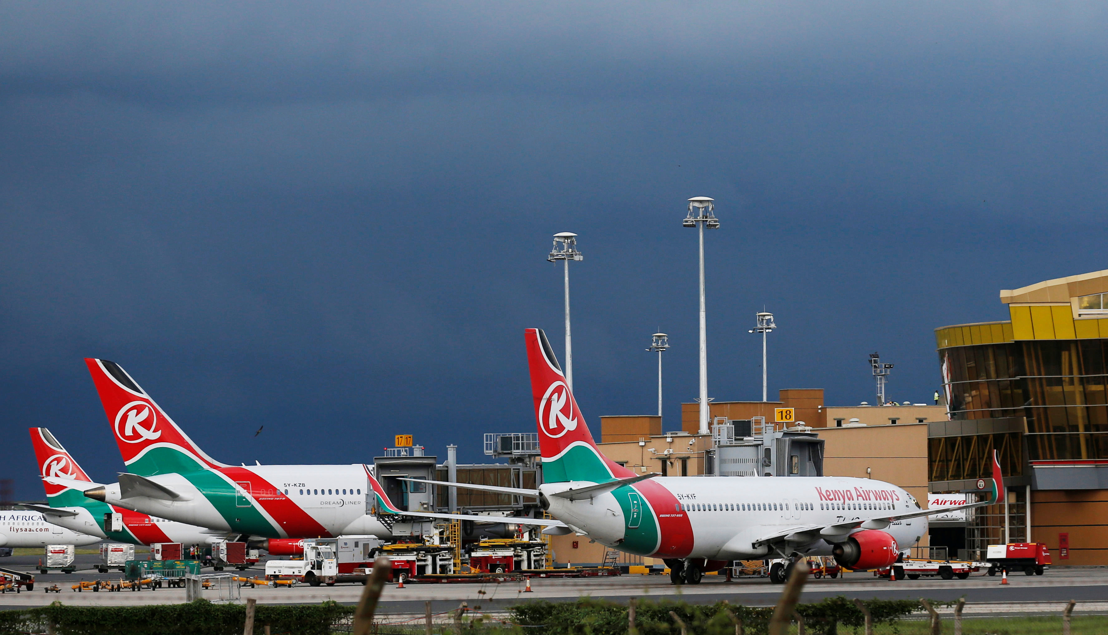 Kenya Airways planes are seen parked at the Jomo Kenyatta International airport near Kenya's capital Nairobi, April 28, 2016
