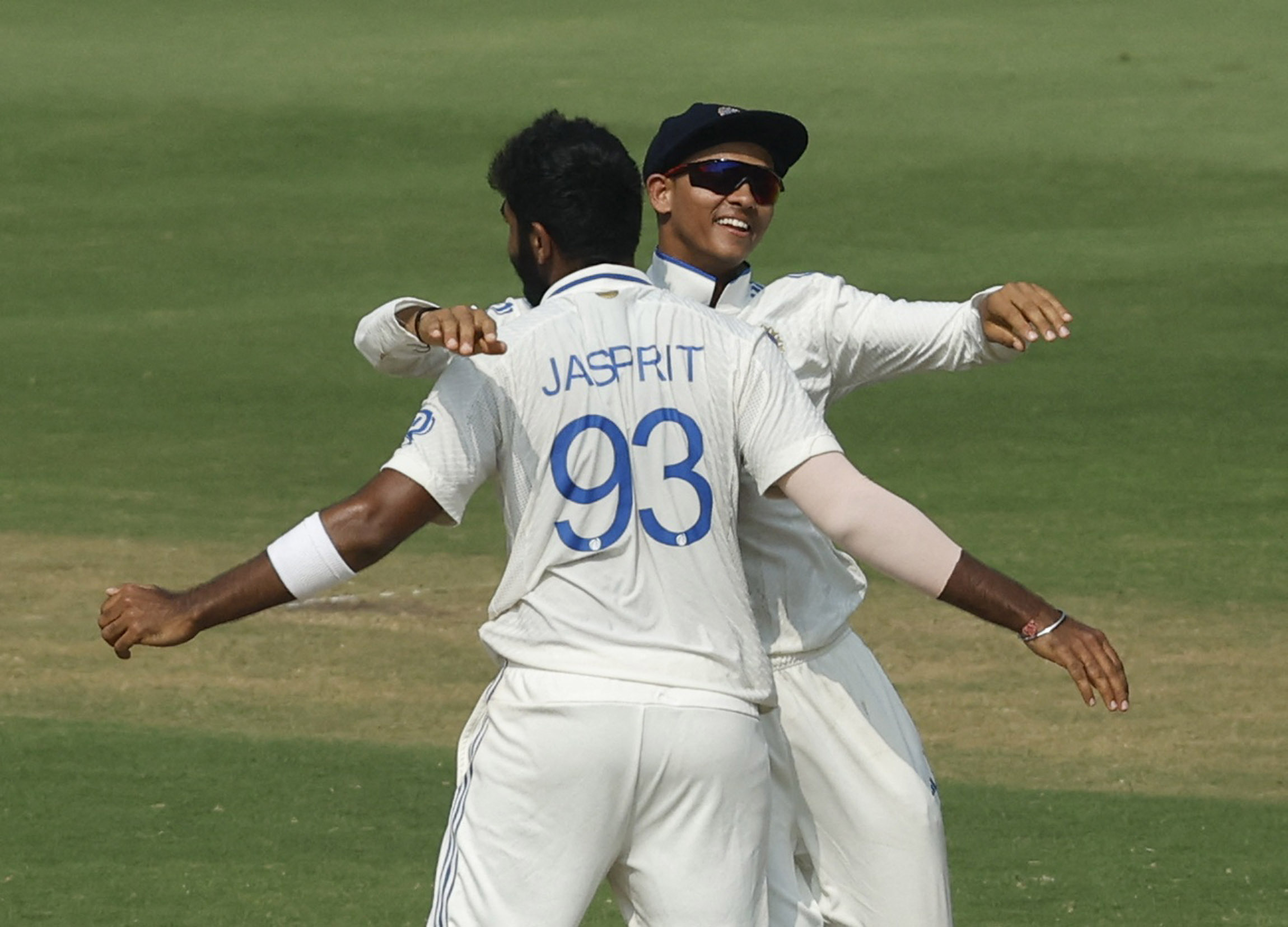 Jasprit Bumrah celebrates with Yashasvi Jaiswal after taking the wicket of England's Tom Hartley to win the second Test