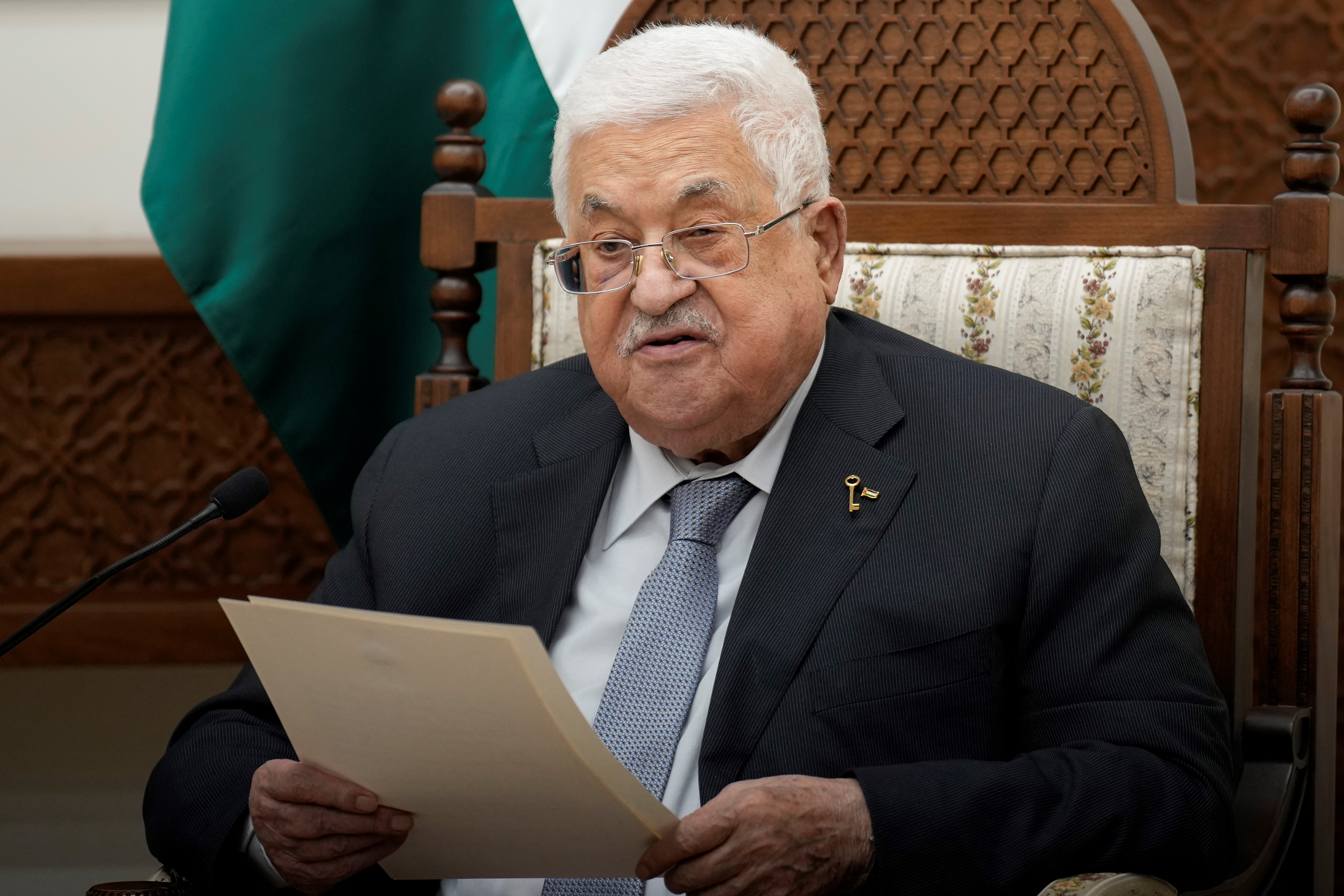 Palestinian President Mahmoud Abbas speaks during a meeting with French President on October 24,