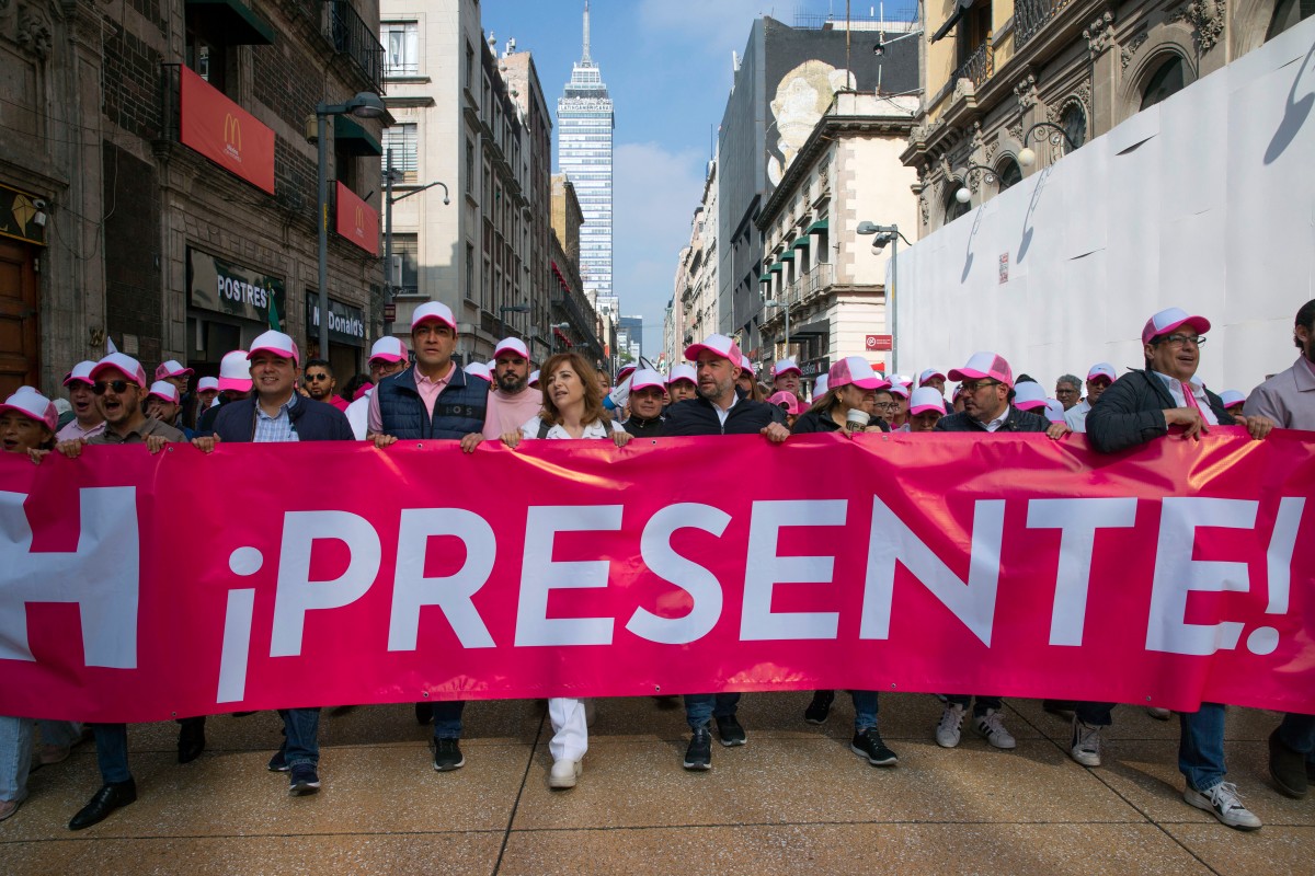 People take parte in a march organized by citizen organizations demanding that electoral autonomy be respected in the upcoming general elections in downtown Mexico City