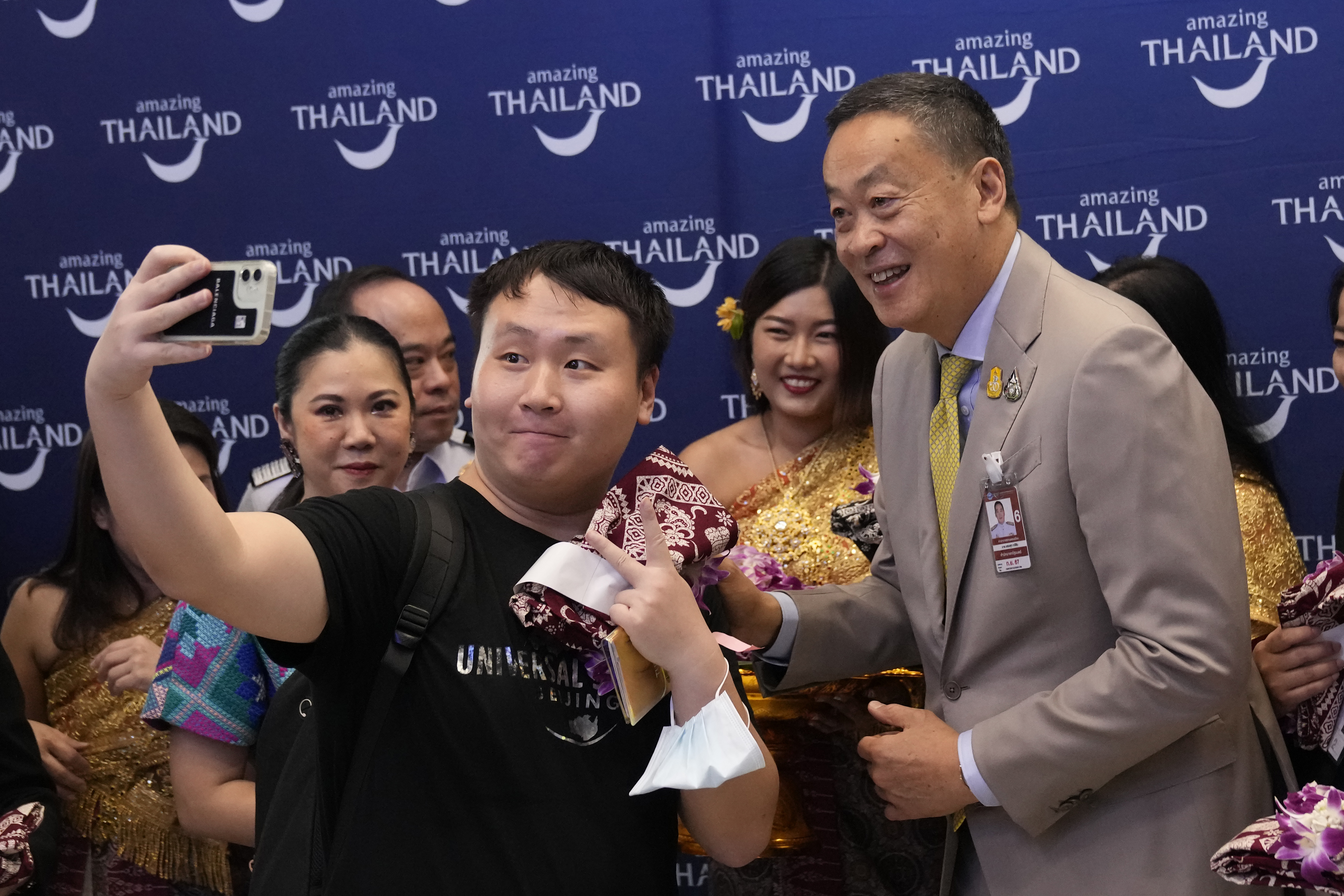 Chinese tourists taking selfies with Thai PM Srettha Thavisin
