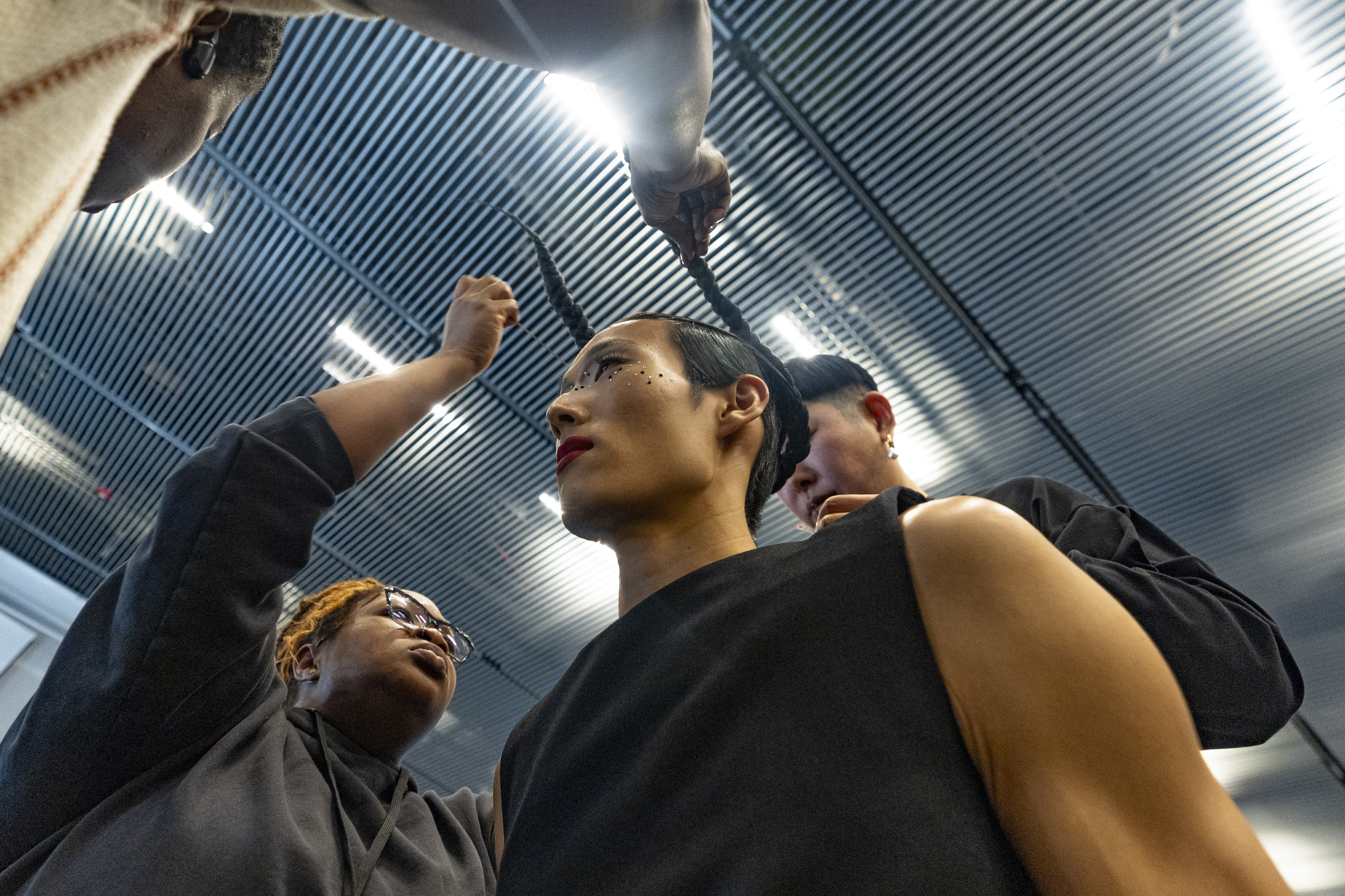 Models are prepped before the Thom Browne fall/winter 2024 fashion show during New York Fashion Week
