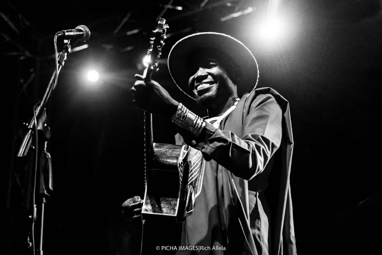 Kenyan musician Winyo during a performance [Wango Alfred/Al Jazeera]