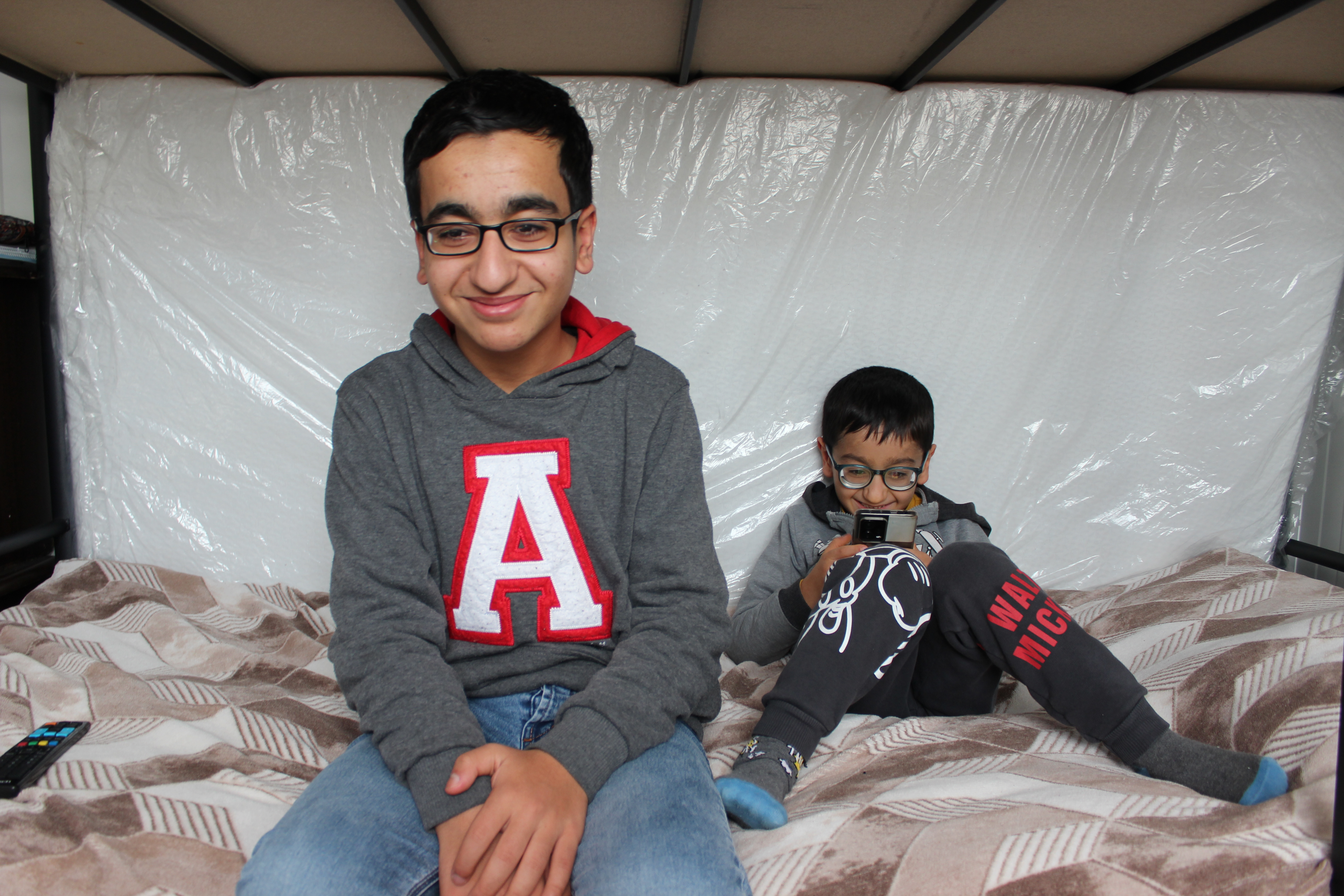 Muhammad Ali, left, and his brother Emir 