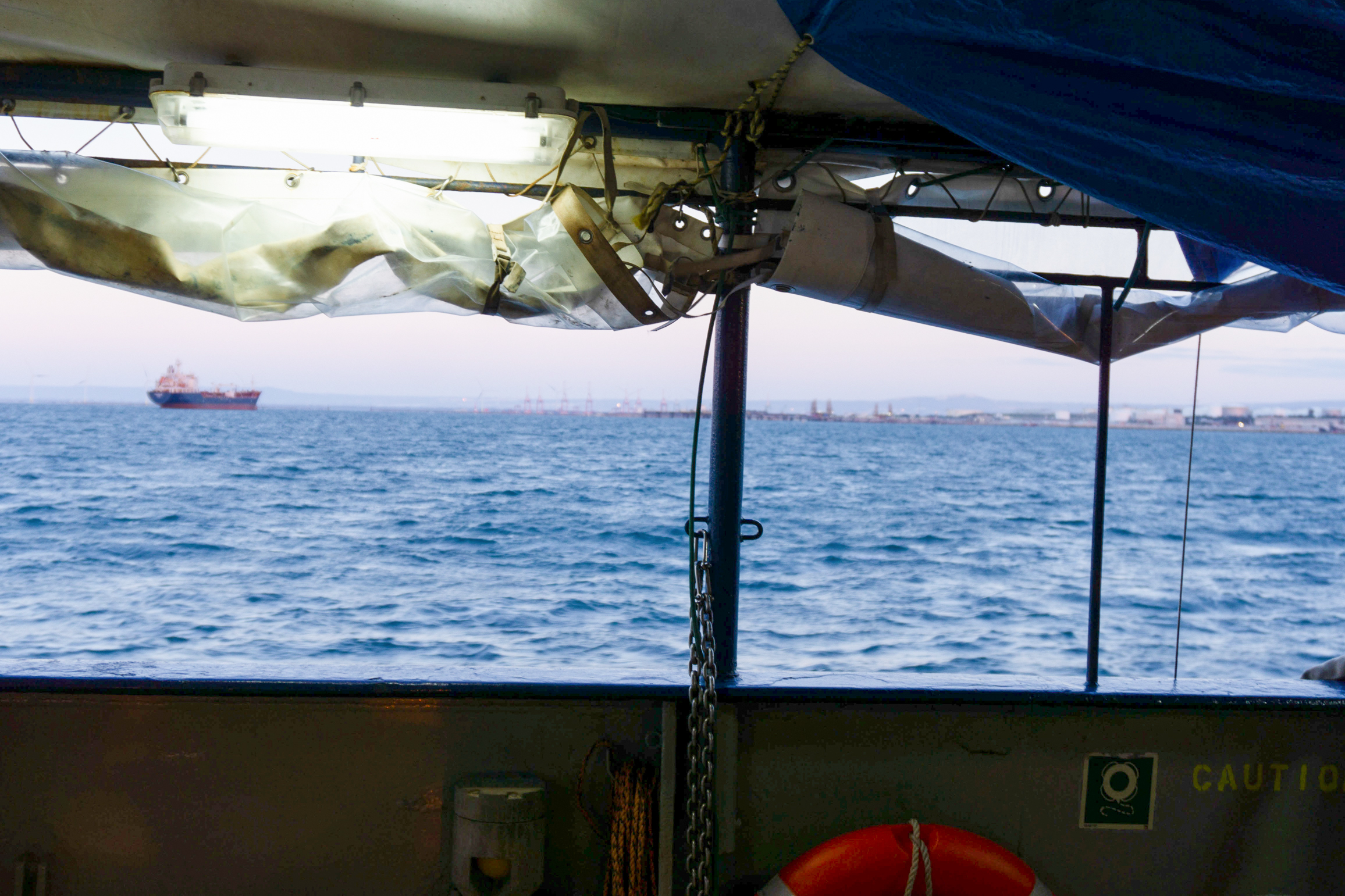The view from the search-and-rescue vessel Humanity 1, approaching Taranto, Italy