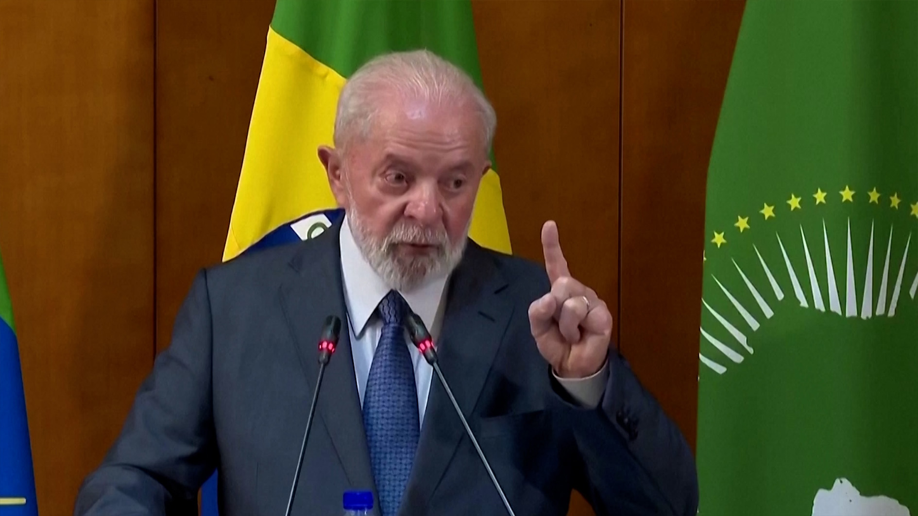 Brazilian President Lula on a podiu.