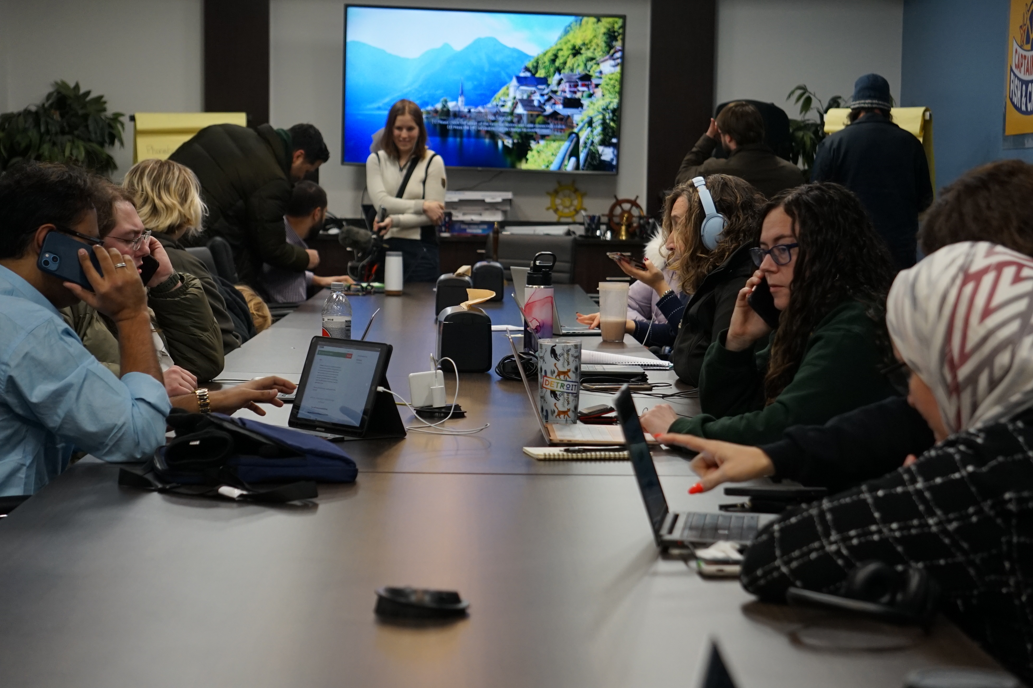 volunteers work at a phone bank in Michigan