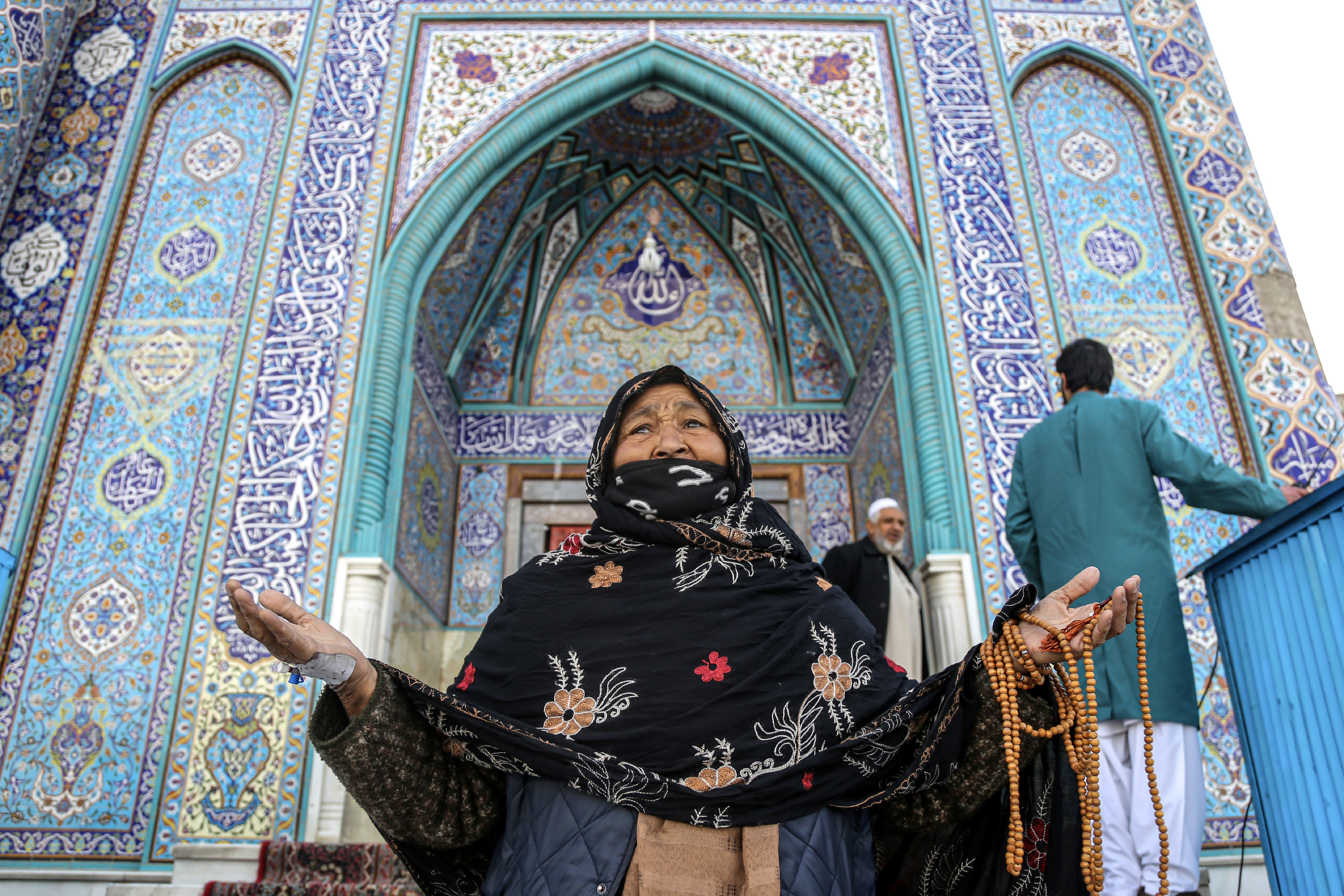 An Afghan woman visits the Shrine of Saint Sakhi Saib