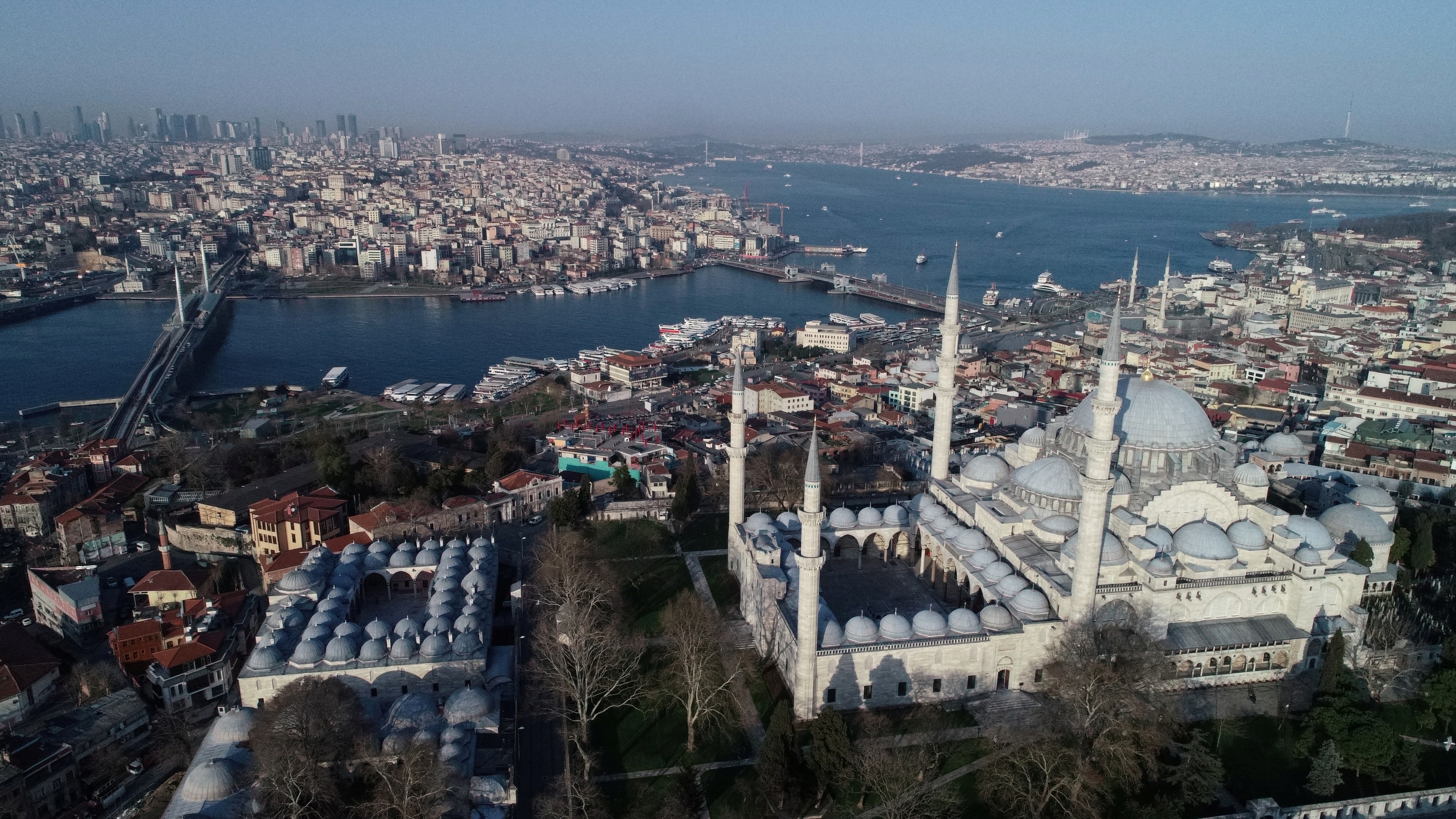An aerial view of the city and Suleymaniye Mosque during the outbreak of the coronavirus disease (COVID-19), in Istanbul, Turkey, March 30, 2020. Picture taken with a drone. REUTERS/Umit Bektas