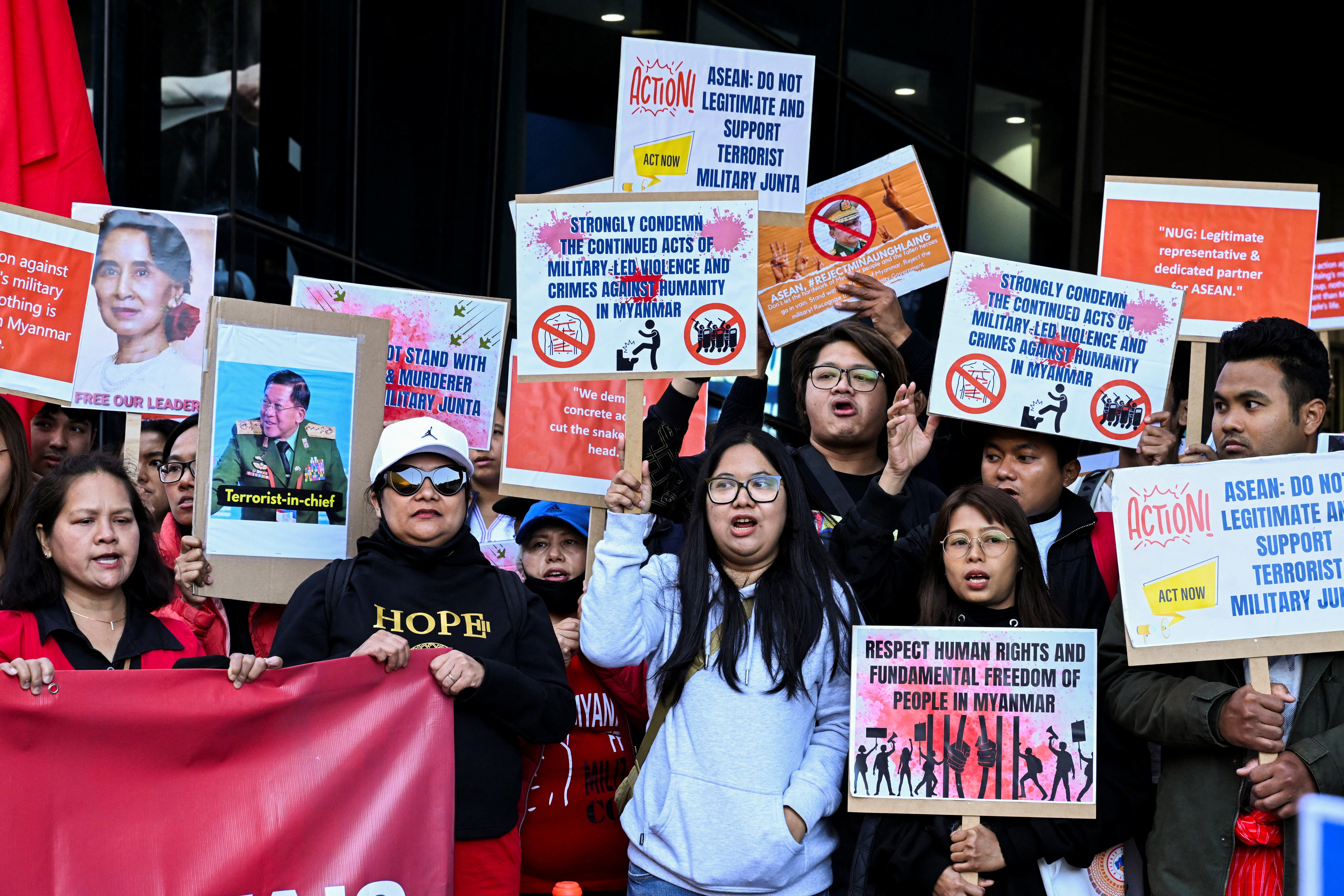 Protesters at the ASEAN-Australia special summit this month. They are holding placards criticising ASEAN