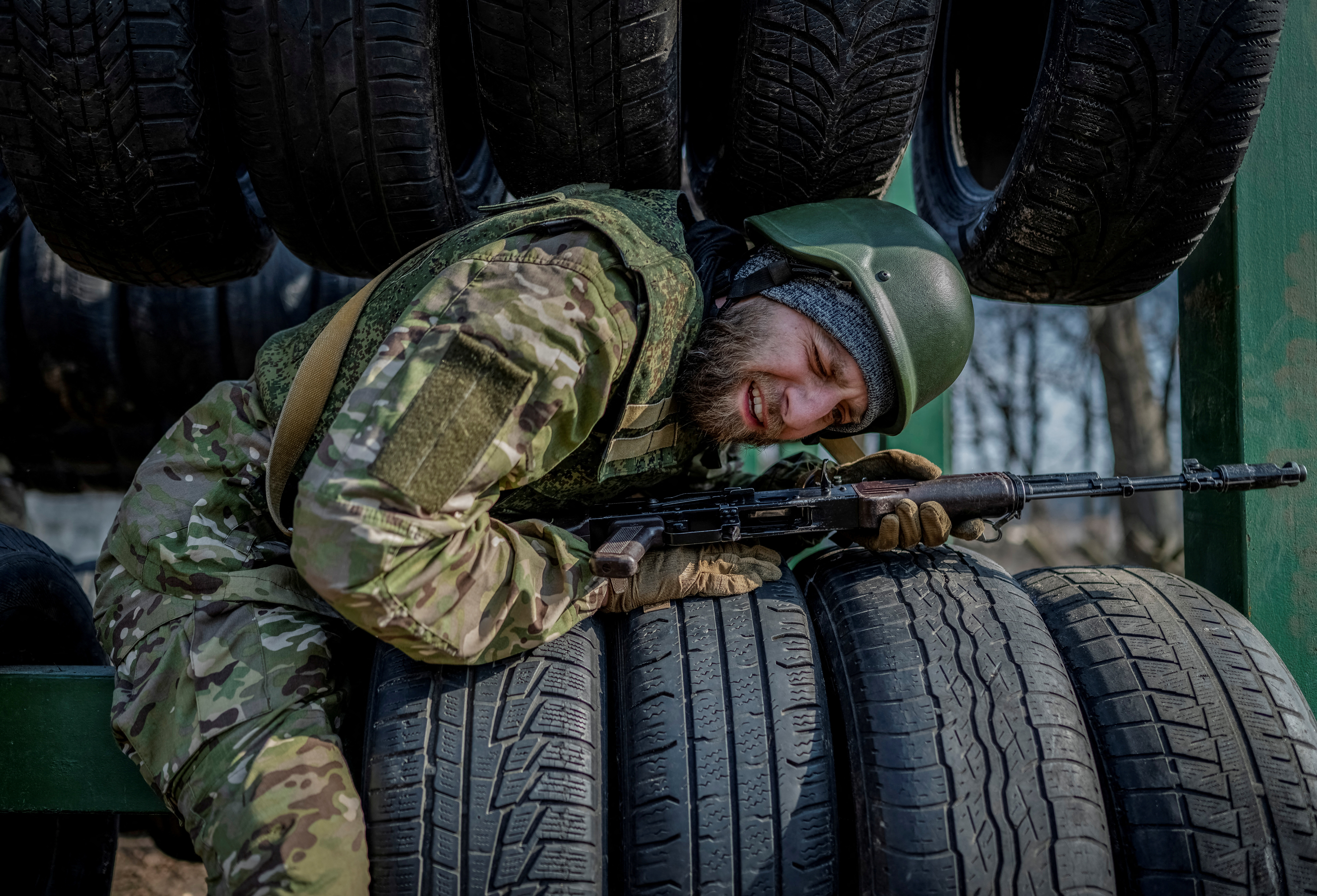 A volunteer who aspires to join the 3rd Separate Assault Brigade of the Ukrainian Armed Forces takes part in a basic training, amid Russia's attack on Ukraine, in Kyiv region, Ukraine March 5, 2024. REUTERS/Viacheslav Ratynskyi TPX IMAGES OF THE DAY