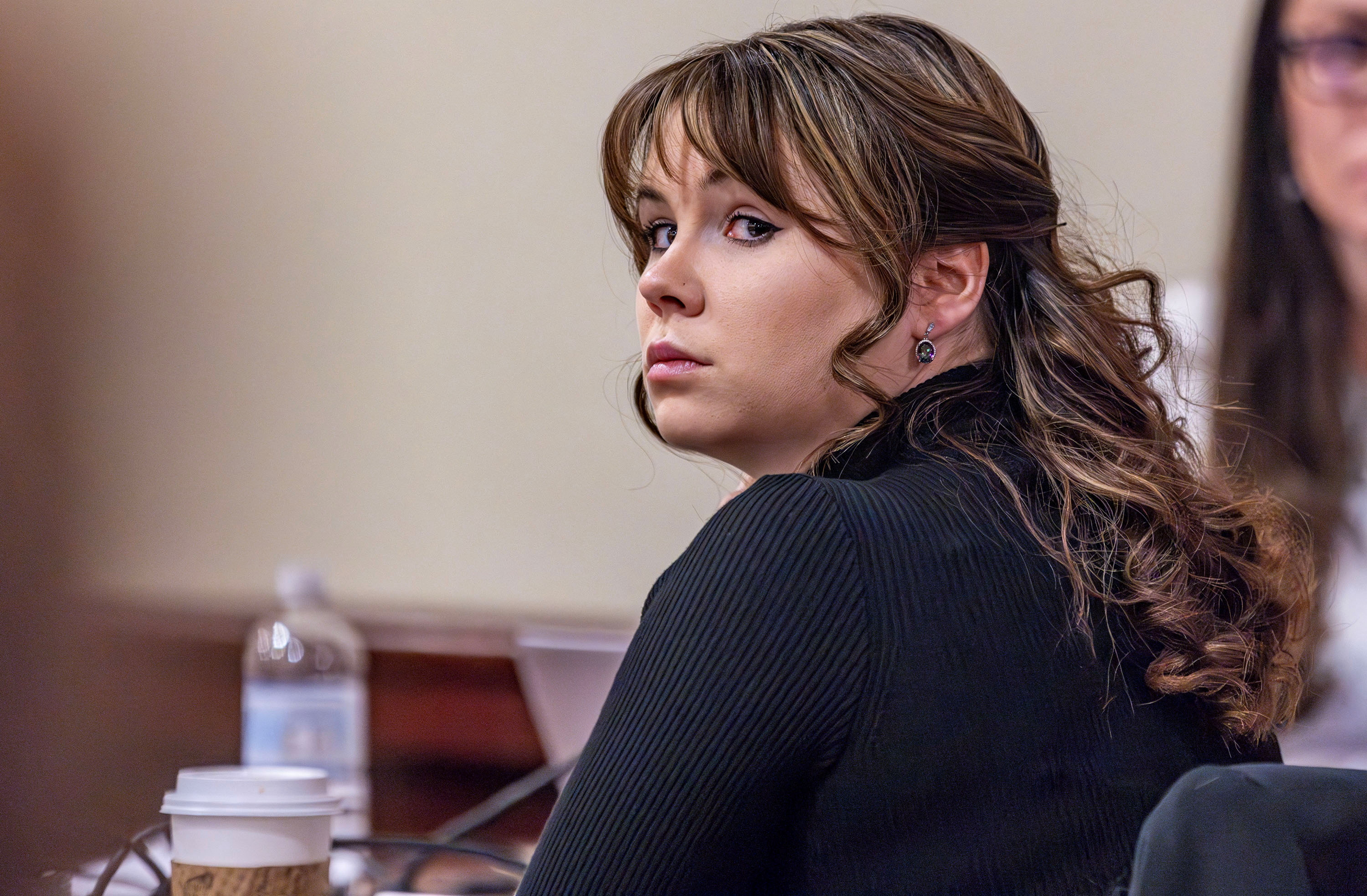 Hannah Gutierrez-Reed, the former armorer at the movie Rust, listens to closing arguments in her trial at First District Court in Santa Fe