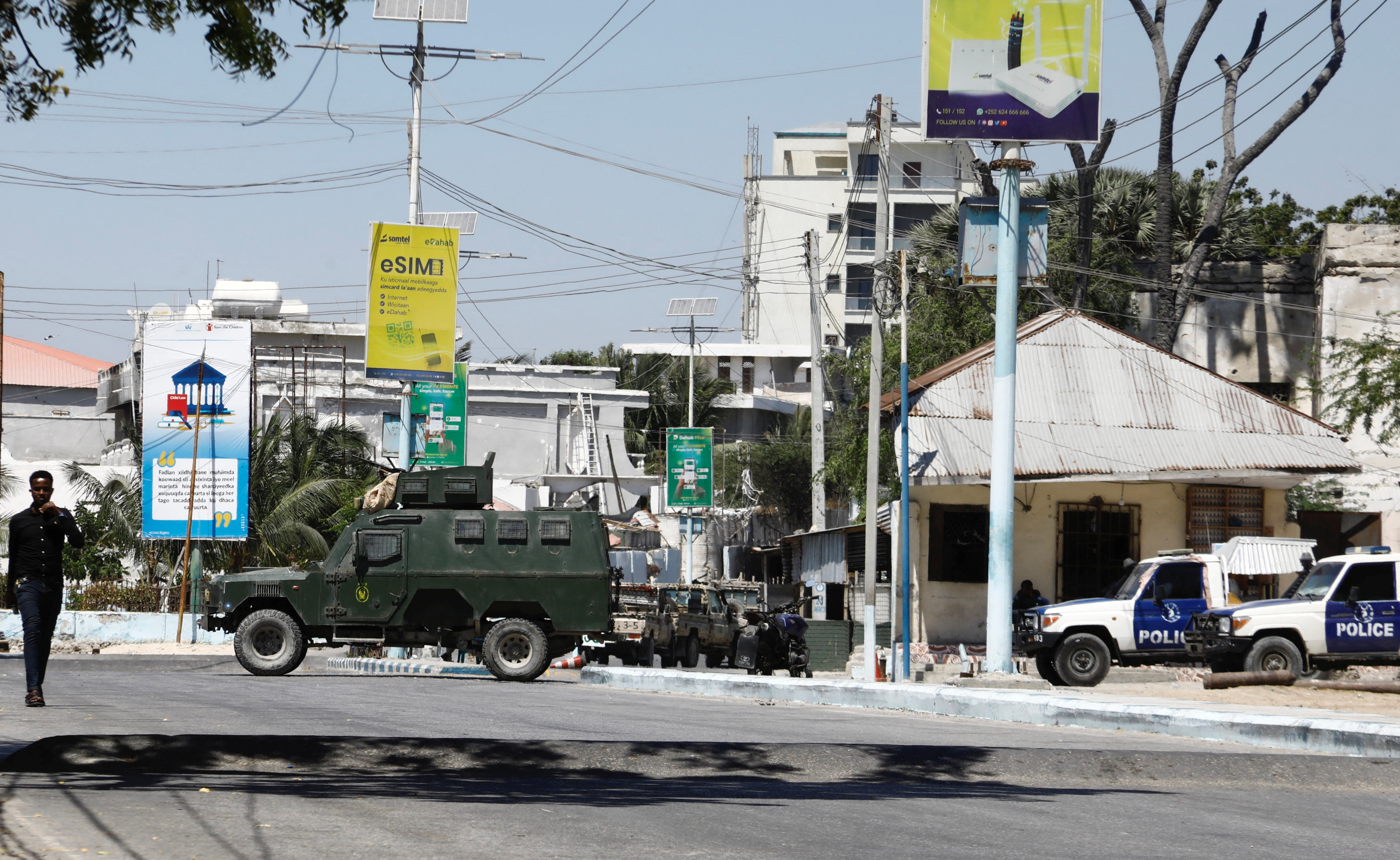 Vehicles of Somali security officers are parked near Syl Hotel, the scene of an al Qaeda-linked al Shabaab group's attack, in Mogadishu, Somalia