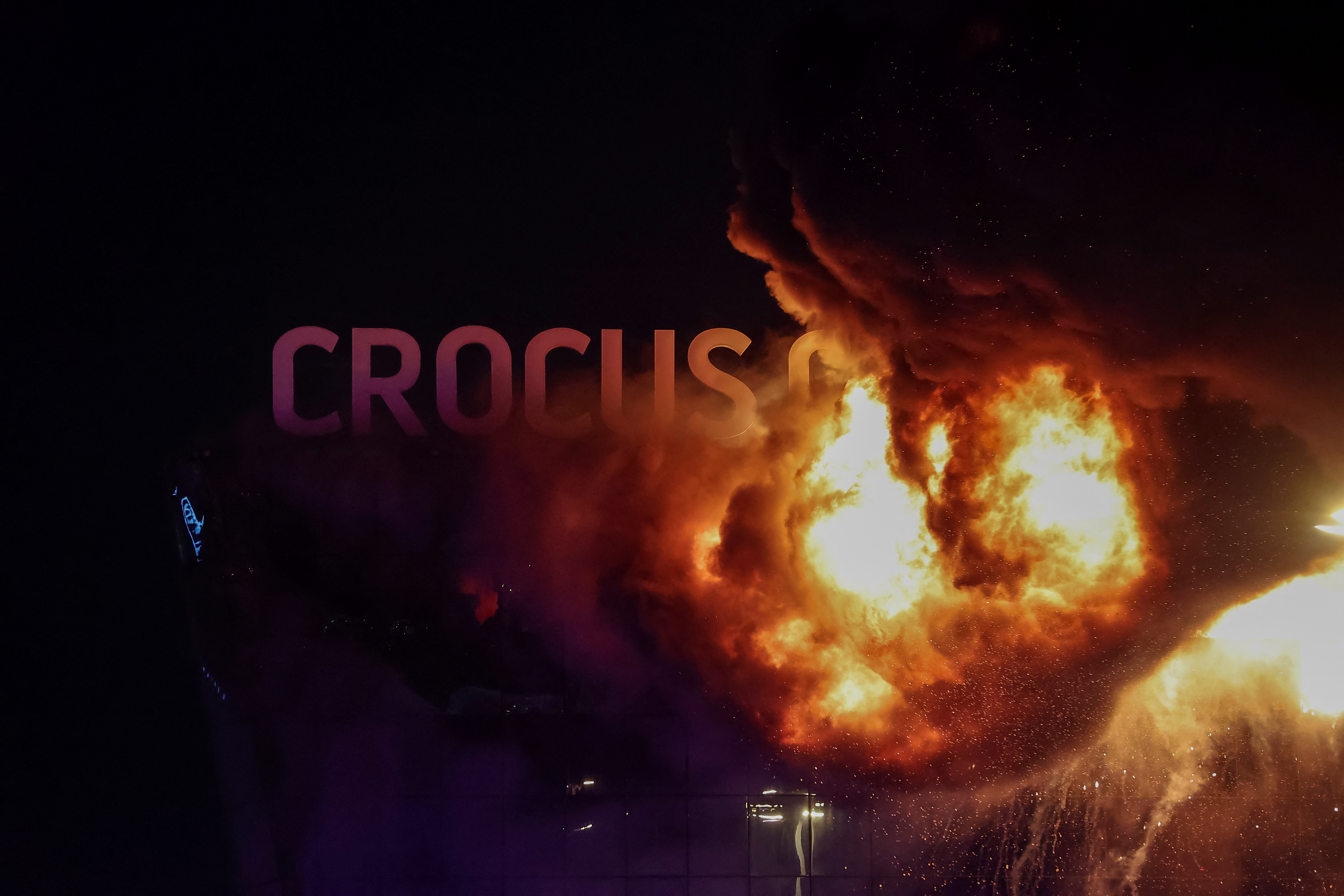 View of the burning Crocus City Hall concert venue following a shooting incident, outside Moscow, Russia, March 22, 2024. REUTERS/Yulia Morozova