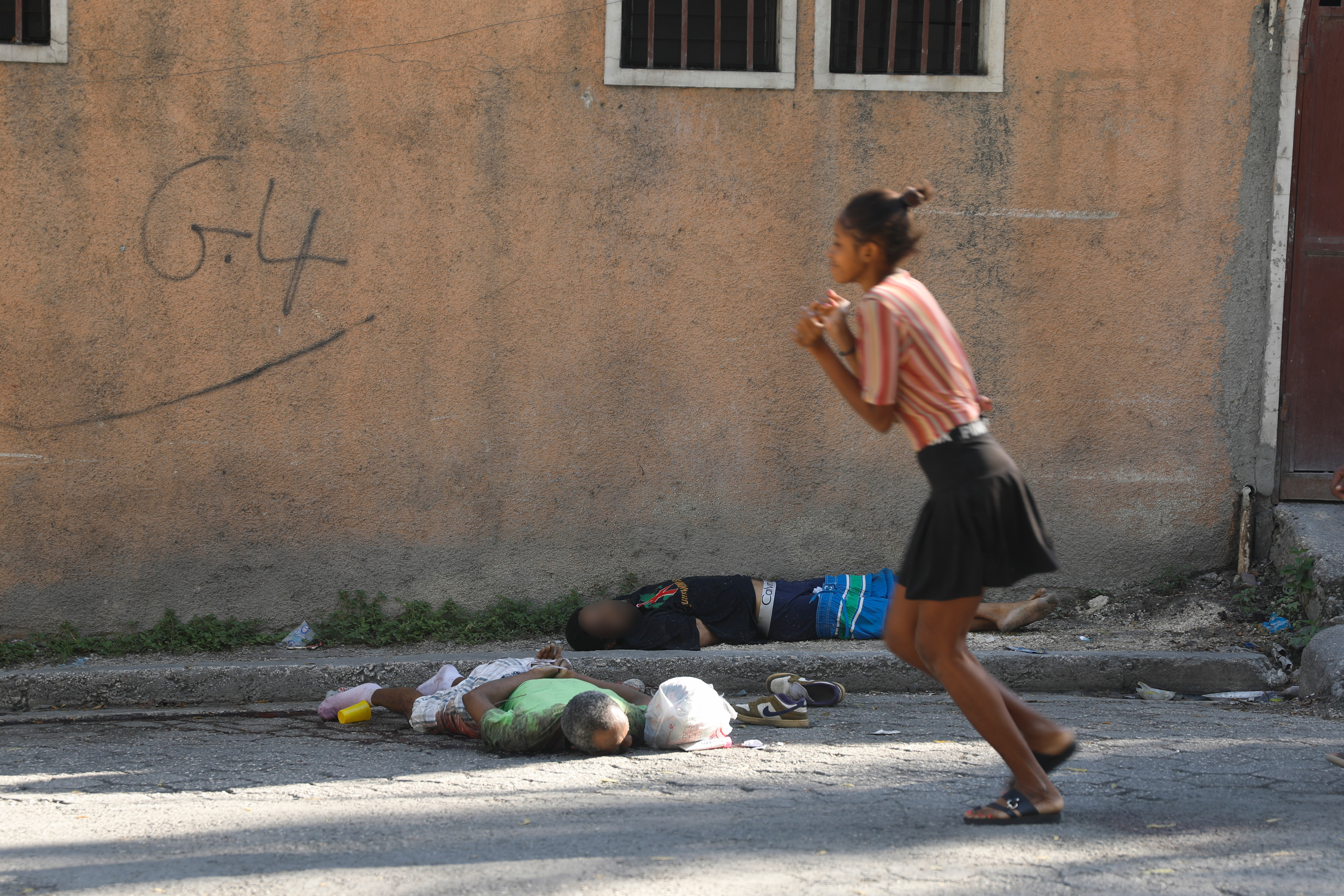 An inmate stands at the National Penitentiary in downtown Port-au-Prince