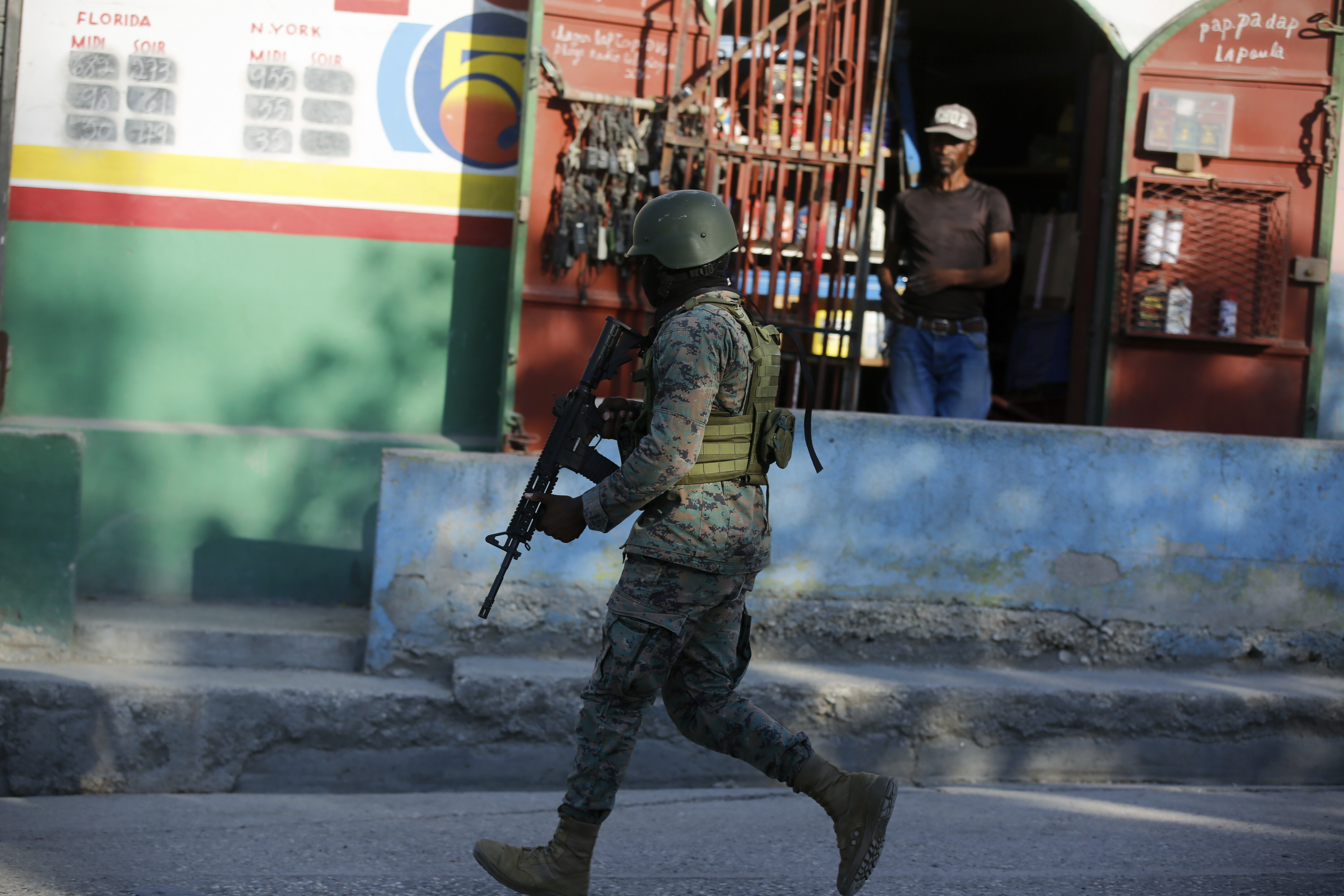A soldier patrols the outskirts of the international airport