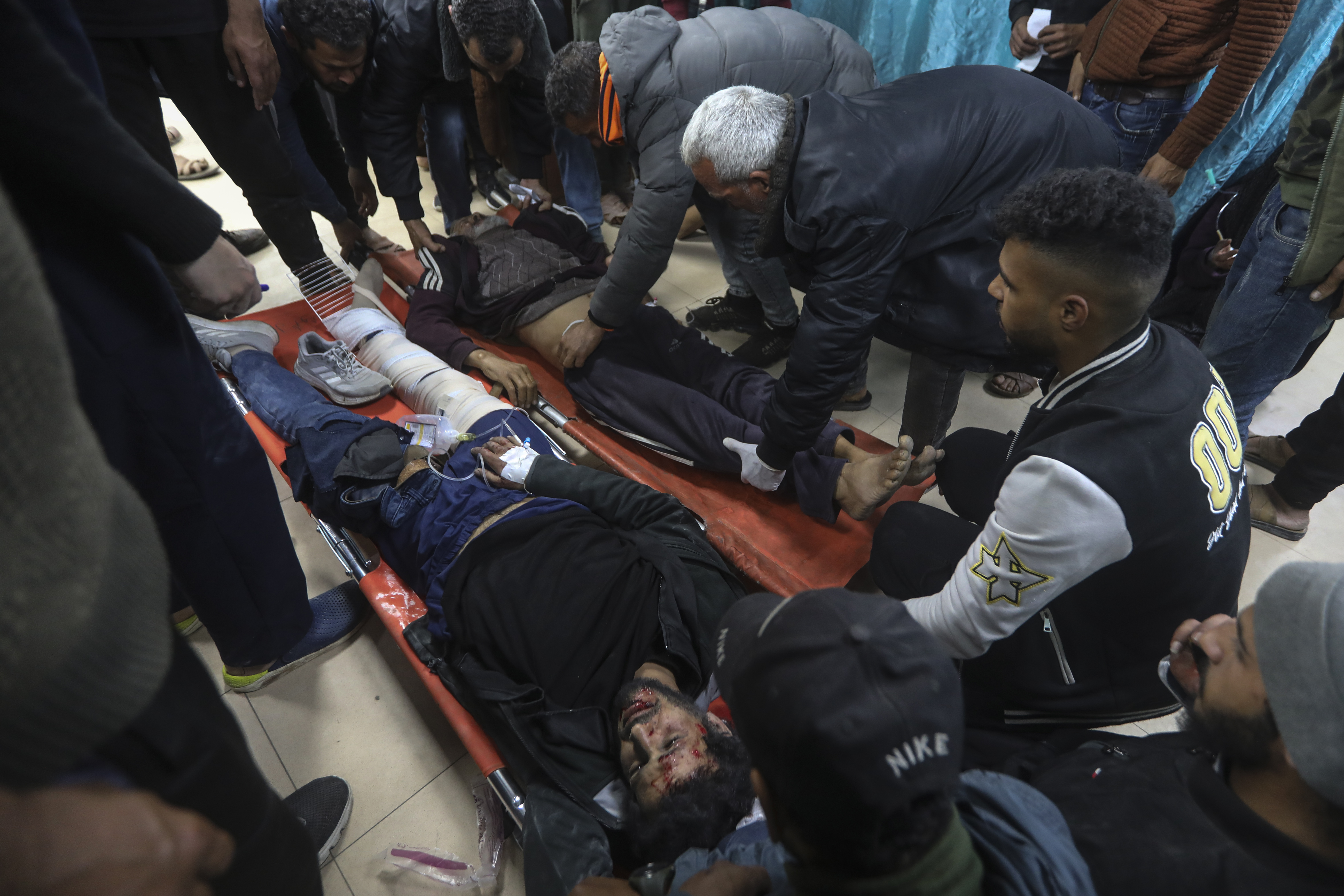 Palestinians wounded in the Israeli bombardment of the Gaza Strip are brought to Al Aqsa hospital in Deir al Balah, Gaza Strip, Monday, March 25, 2024.